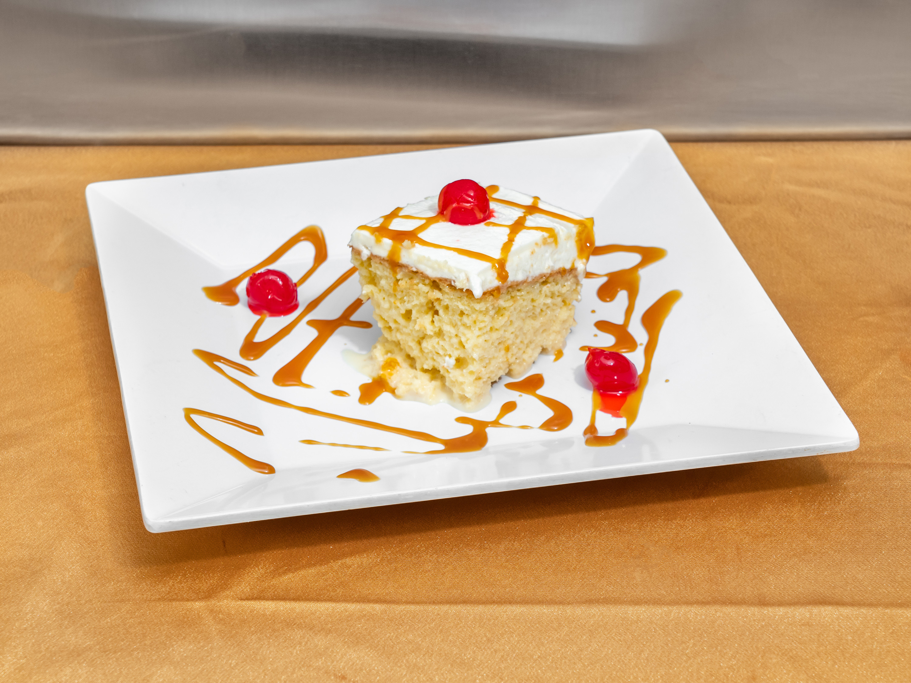 Order Tres Leches food online from Pita Grill store, New York on bringmethat.com