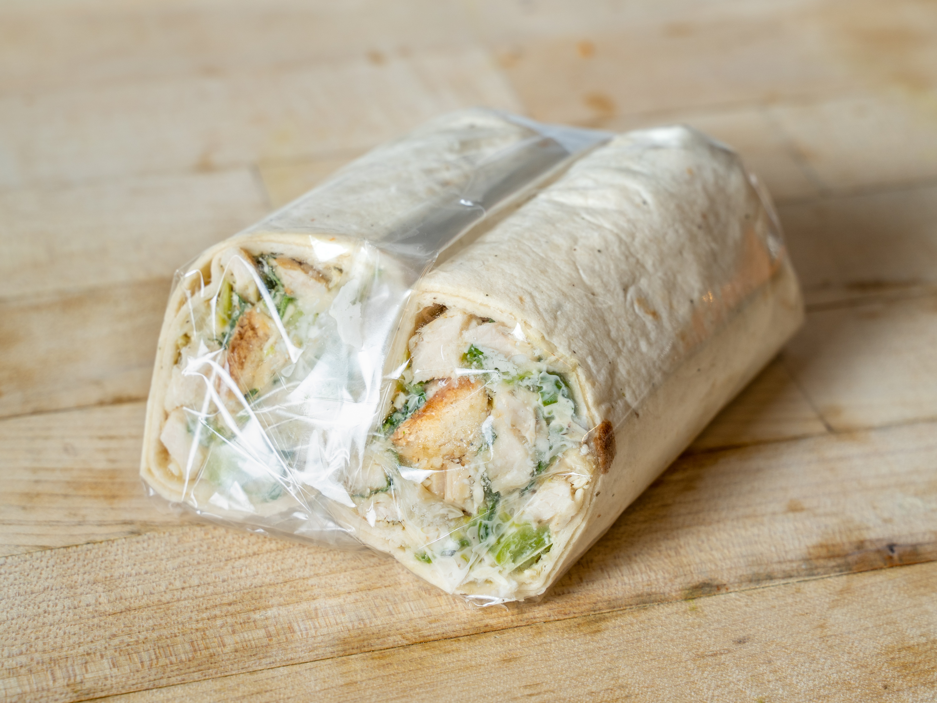 Order Chicken Caesar Wrap food online from Ready To Eat store, New York on bringmethat.com