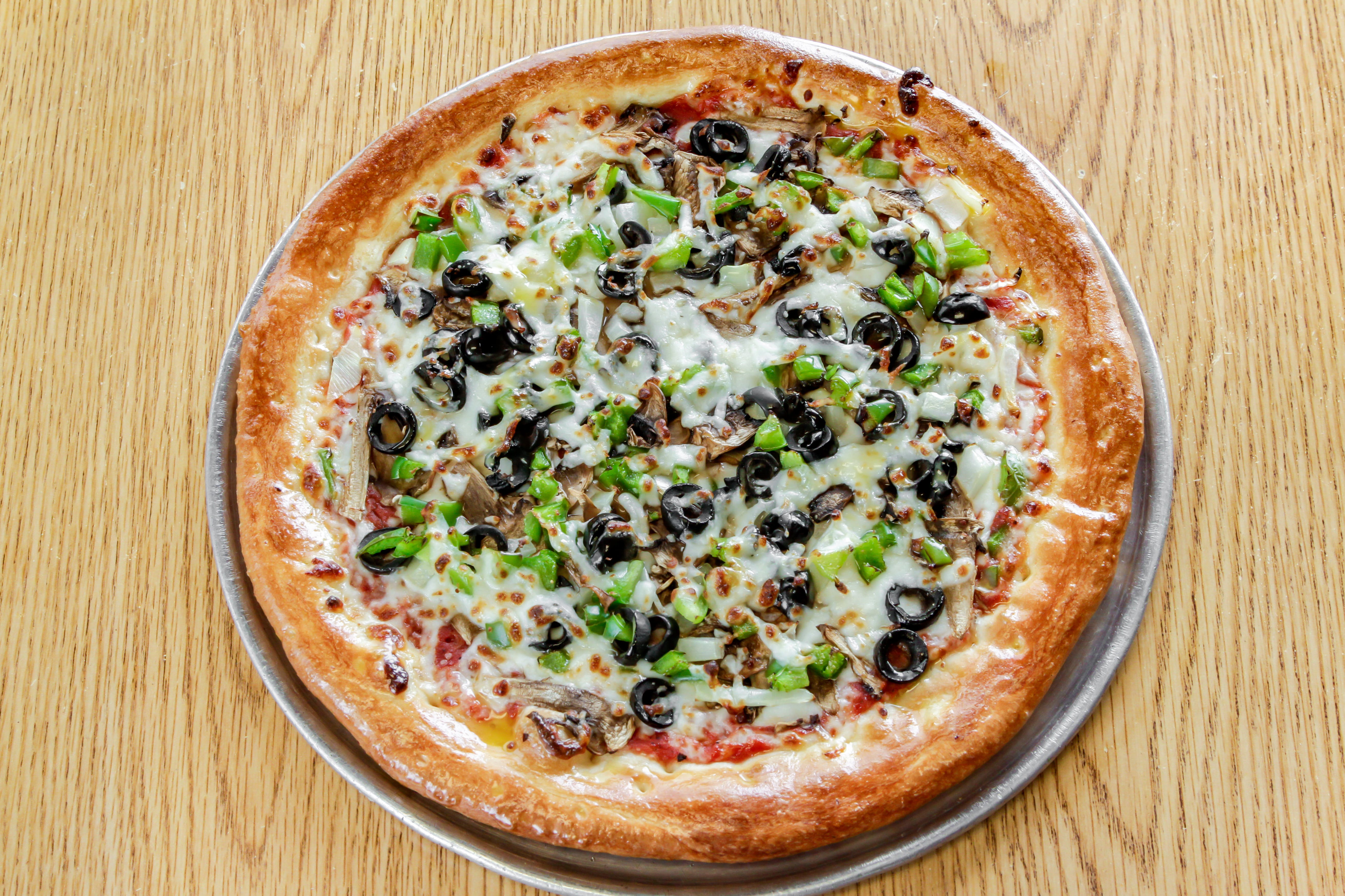 Order The Garden Pizza - Small 10" food online from Marios Pizza store, Tucson on bringmethat.com