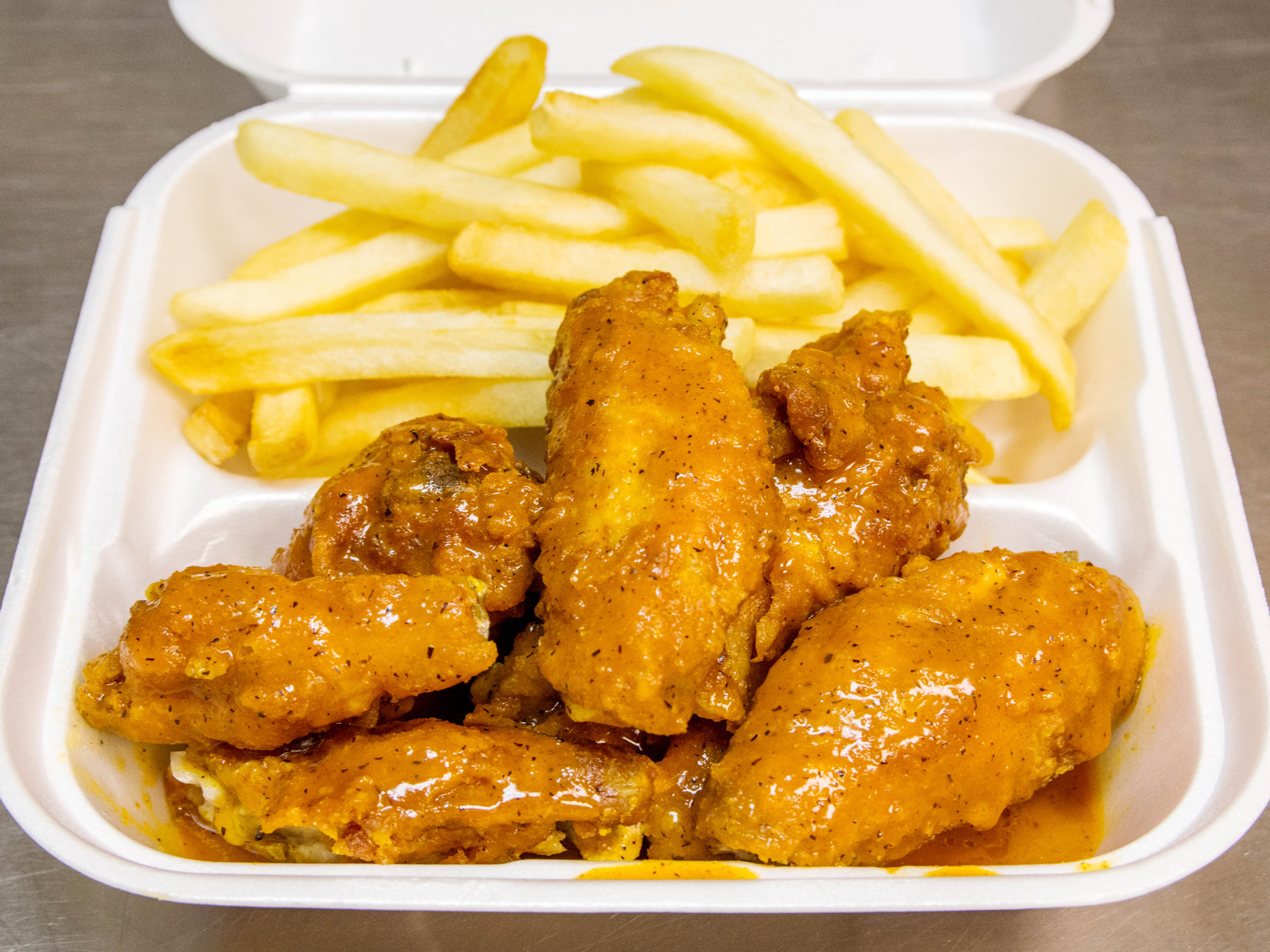 Order 8 Buffalo Wings food online from York Pizza Subs & Wings store, Baltimore on bringmethat.com