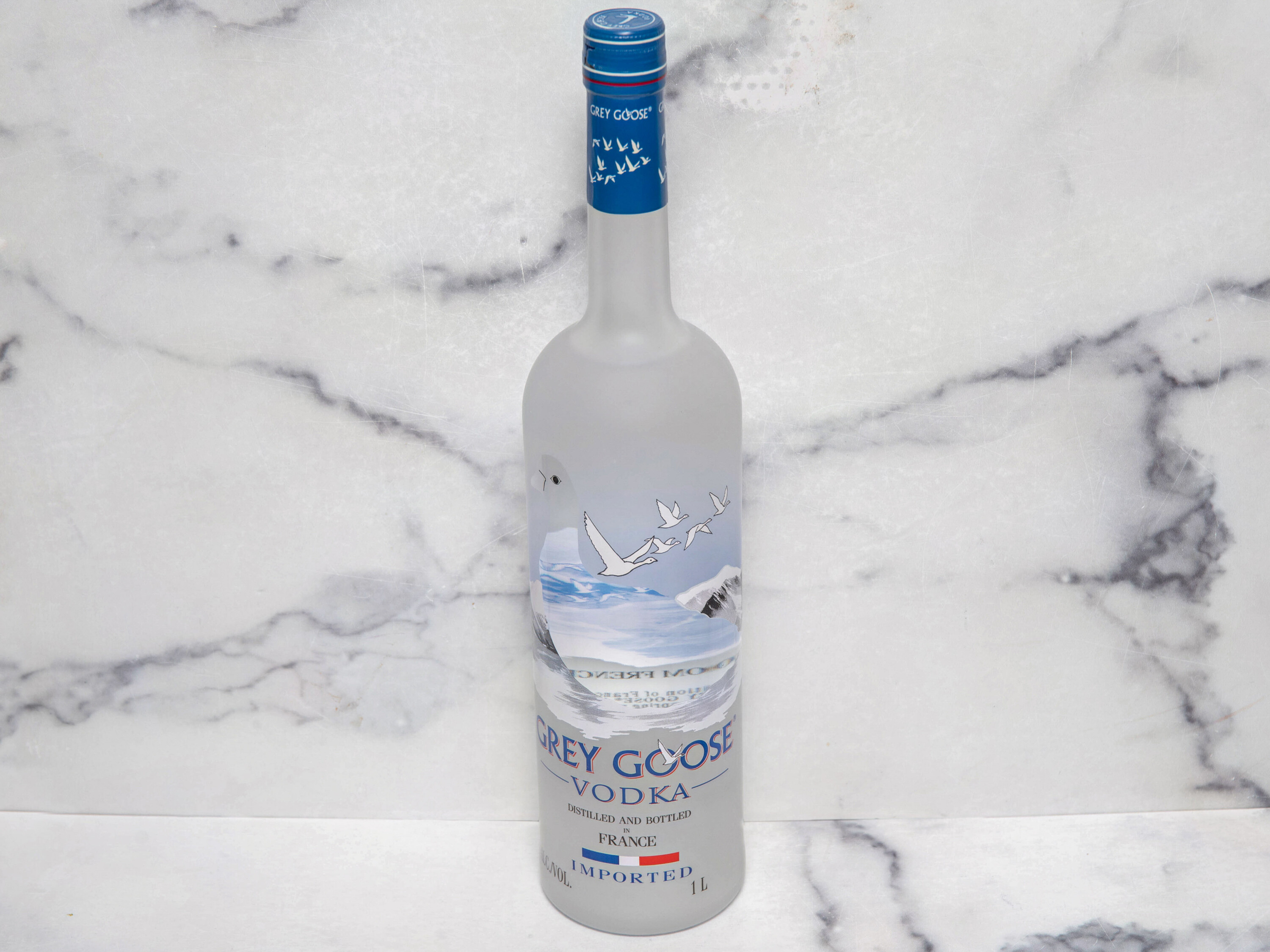 Order Grey Goose Vodka 1 Liter Bottle food online from Dream Mart Liquor store, Huntington on bringmethat.com