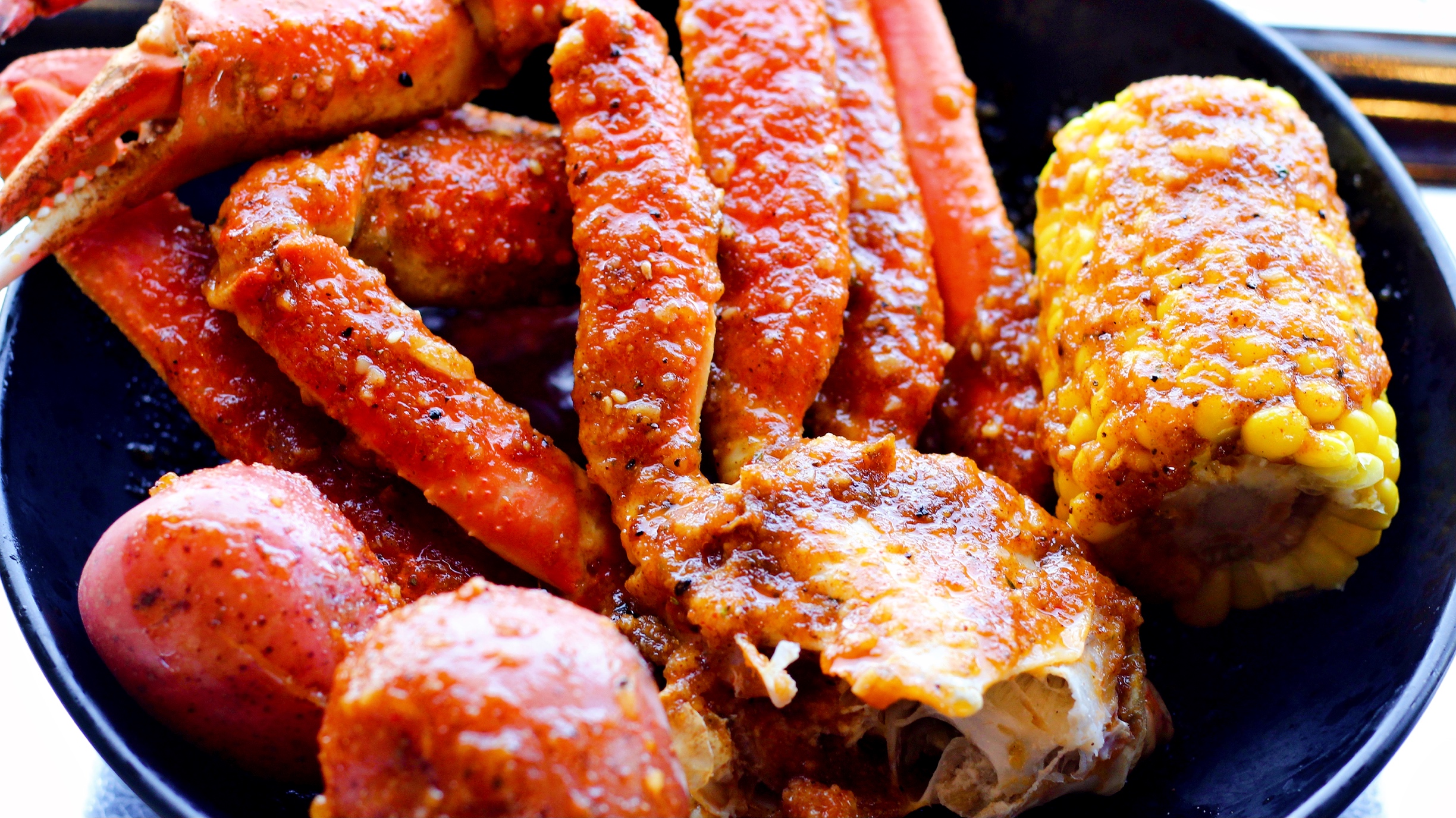 Order M3. Snow Crab Legs (1Lb) food online from Captain King Seafood City store, Memphis on bringmethat.com