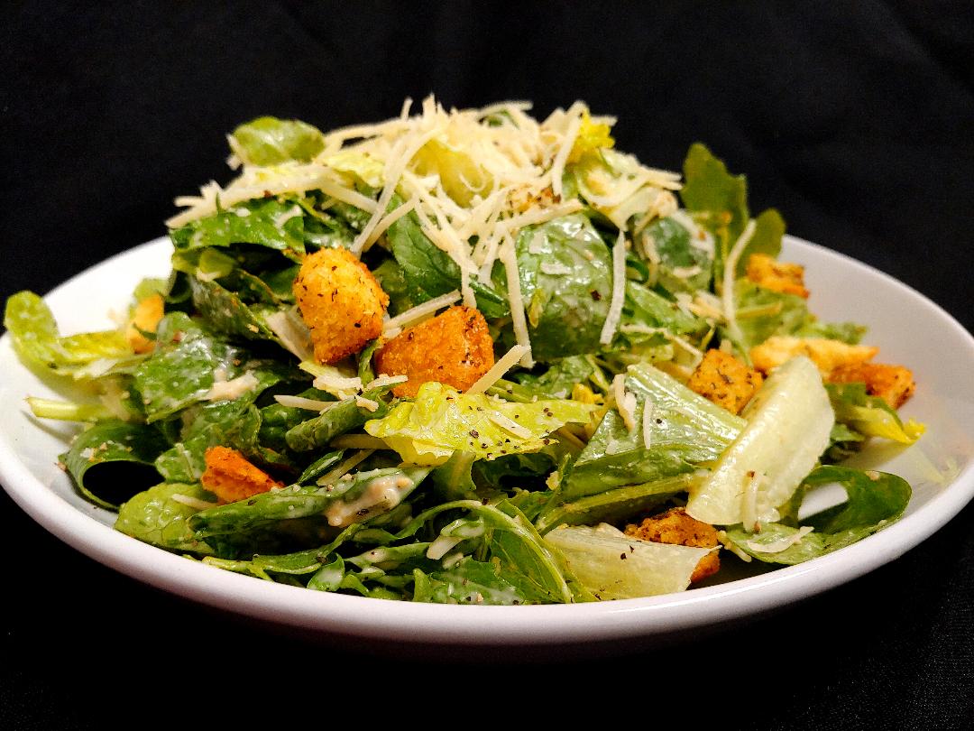 Order Zeoli's Green Caesar Salad food online from Zeoli Restaurant store, Clawson on bringmethat.com