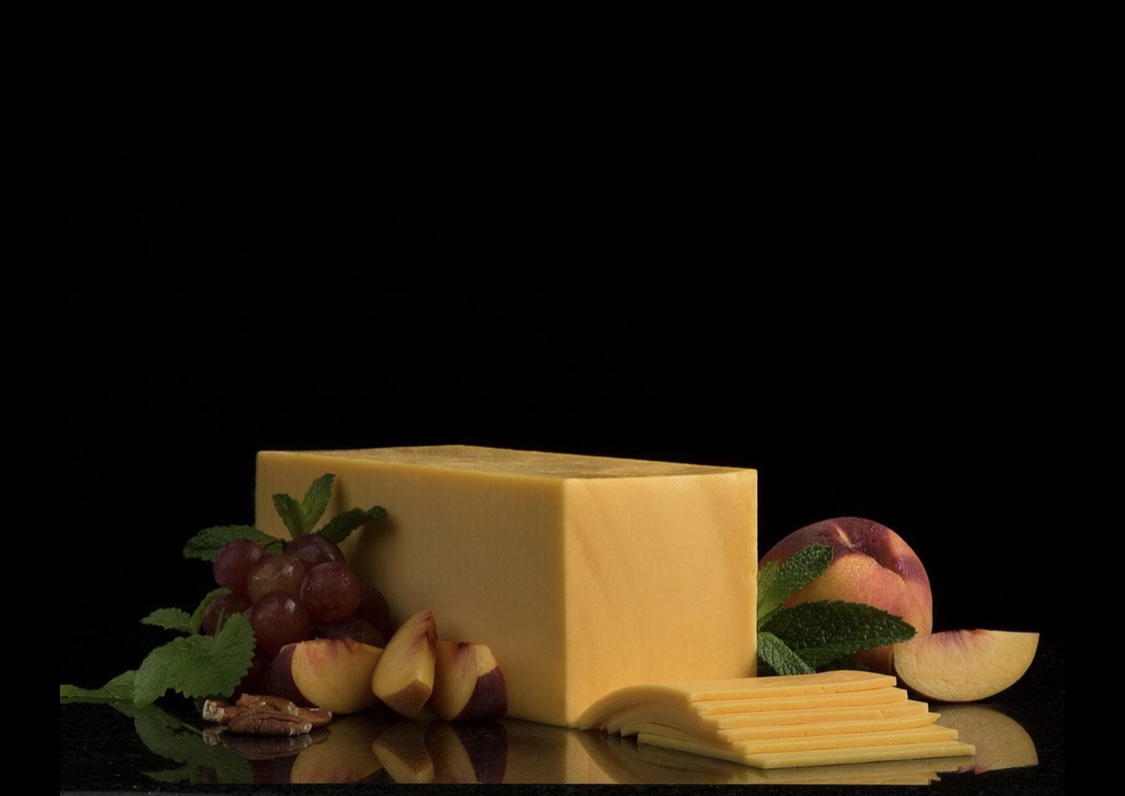 Order Cheddar Cheese  food online from United Gourmet Deli store, New Rochelle on bringmethat.com