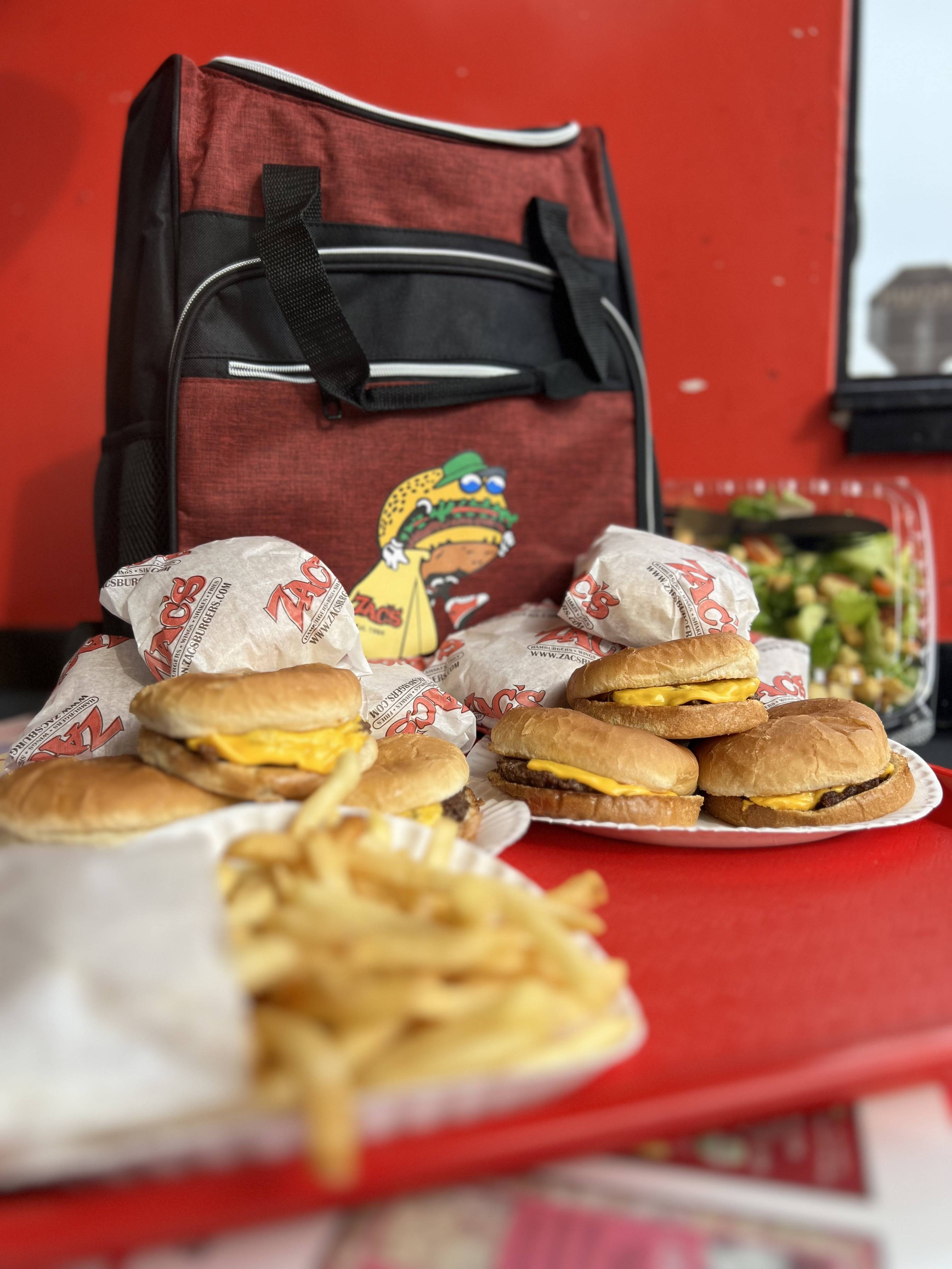 Order 12 Singles w/ Zac's Insulated Back Pack food online from Zacs Hamburgers store, Folsom on bringmethat.com