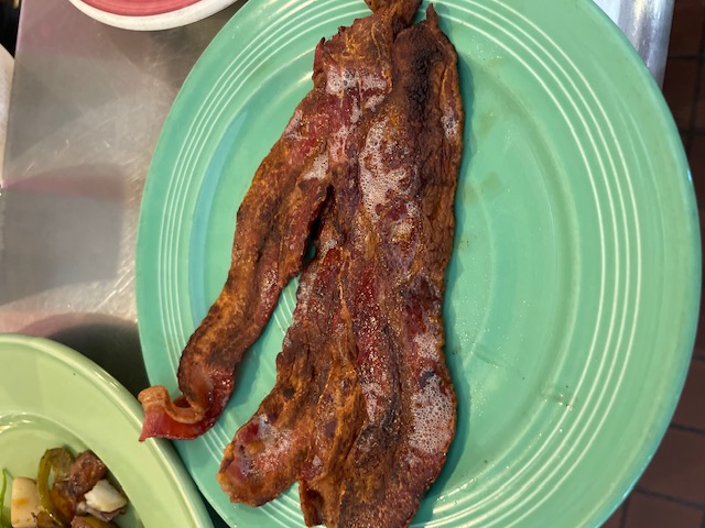 Order 4 Strips of Thick-Sliced Bacon Breakfast A La Carte food online from Ricks Restaurant store, Palm Springs on bringmethat.com