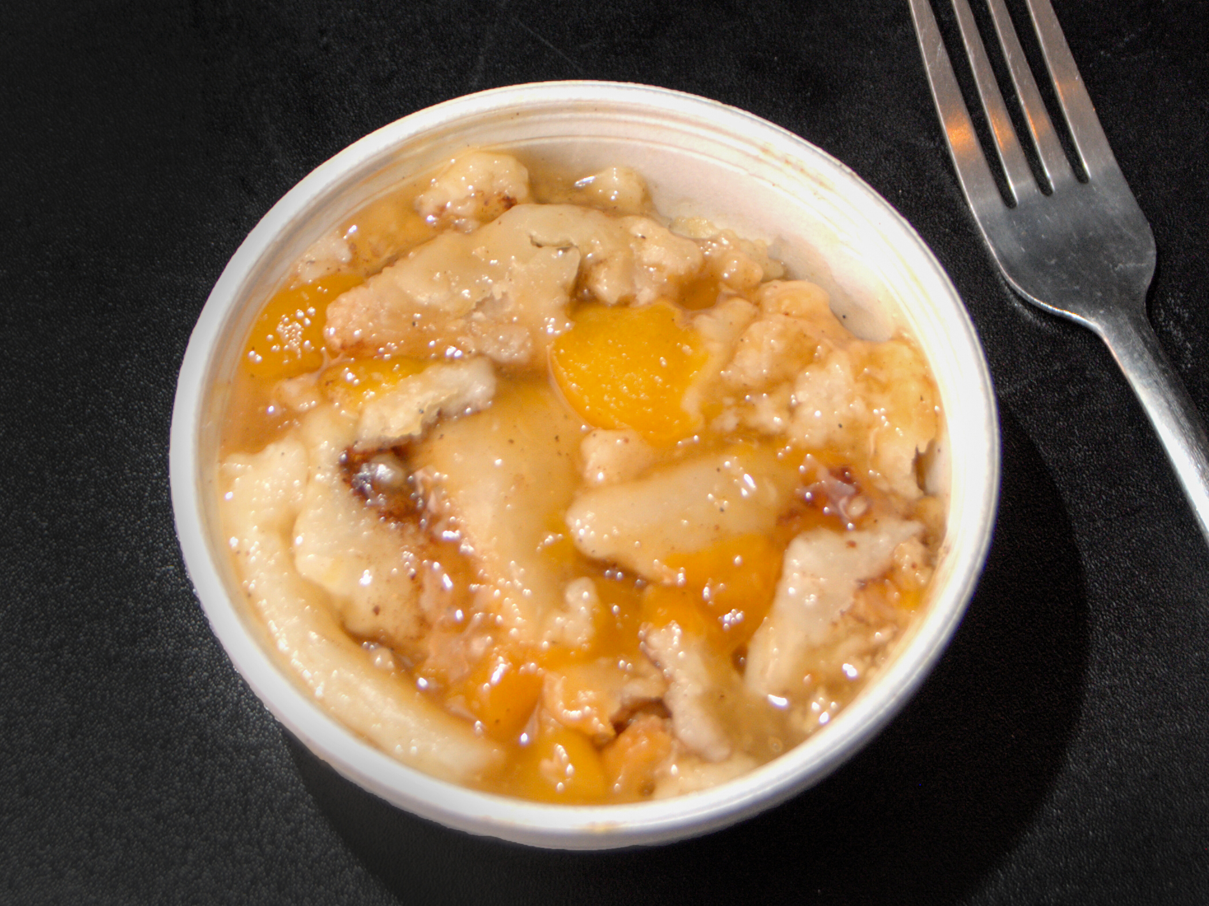 Order Peach Cobbler food online from Club Celebrity store, Detroit on bringmethat.com