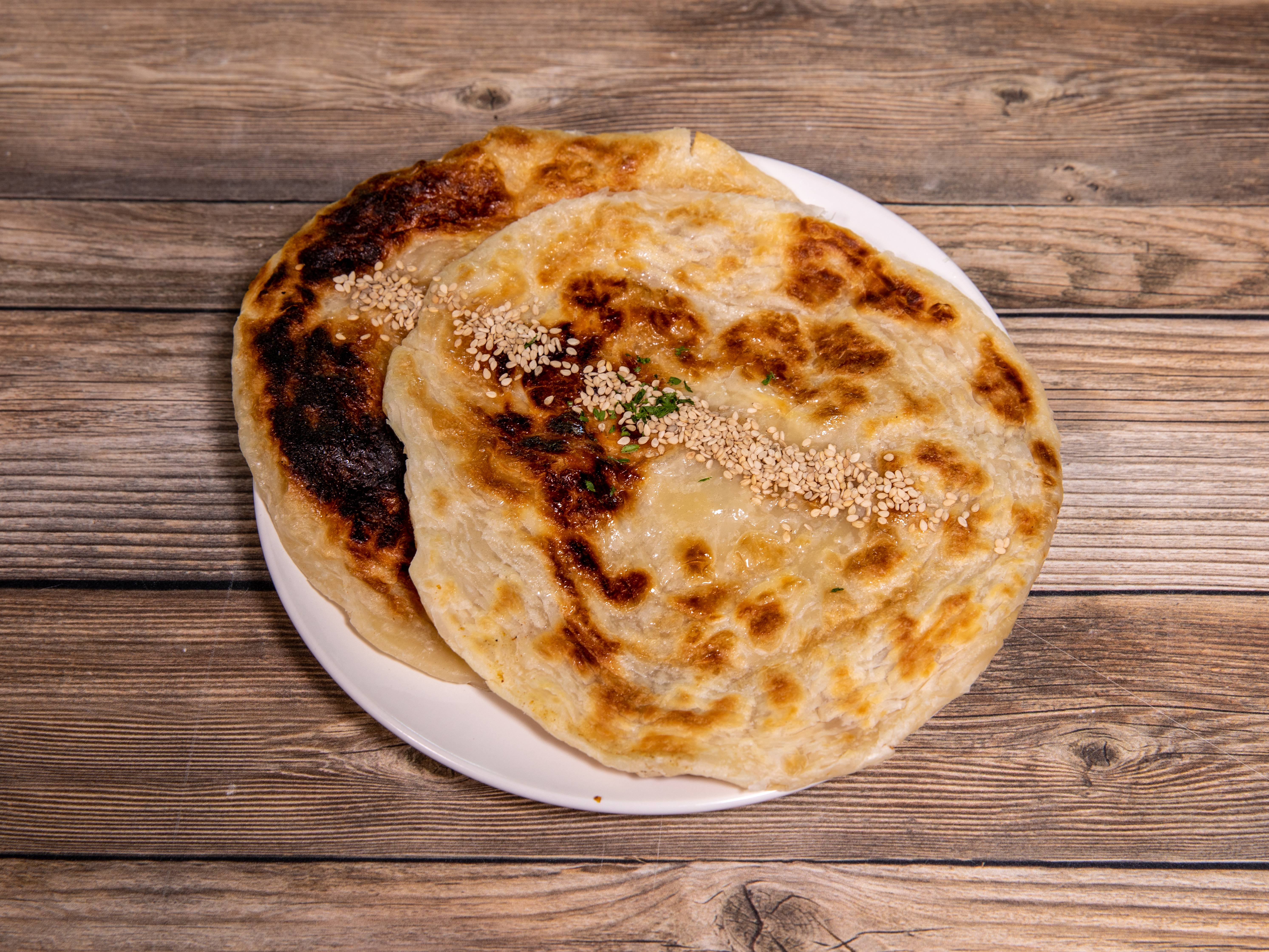 Order Paratha food online from Madras Dhaba store, Austin on bringmethat.com