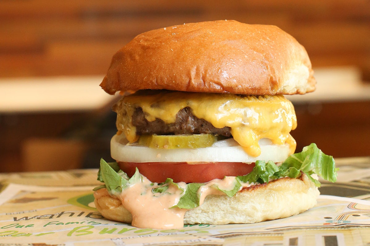 Order THE OUR BURGER food online from Wahlburgers store, Olathe on bringmethat.com