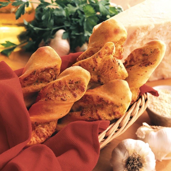 Order Garlic Parmesan Twists food online from Round Table Pizza store, Long Beach on bringmethat.com
