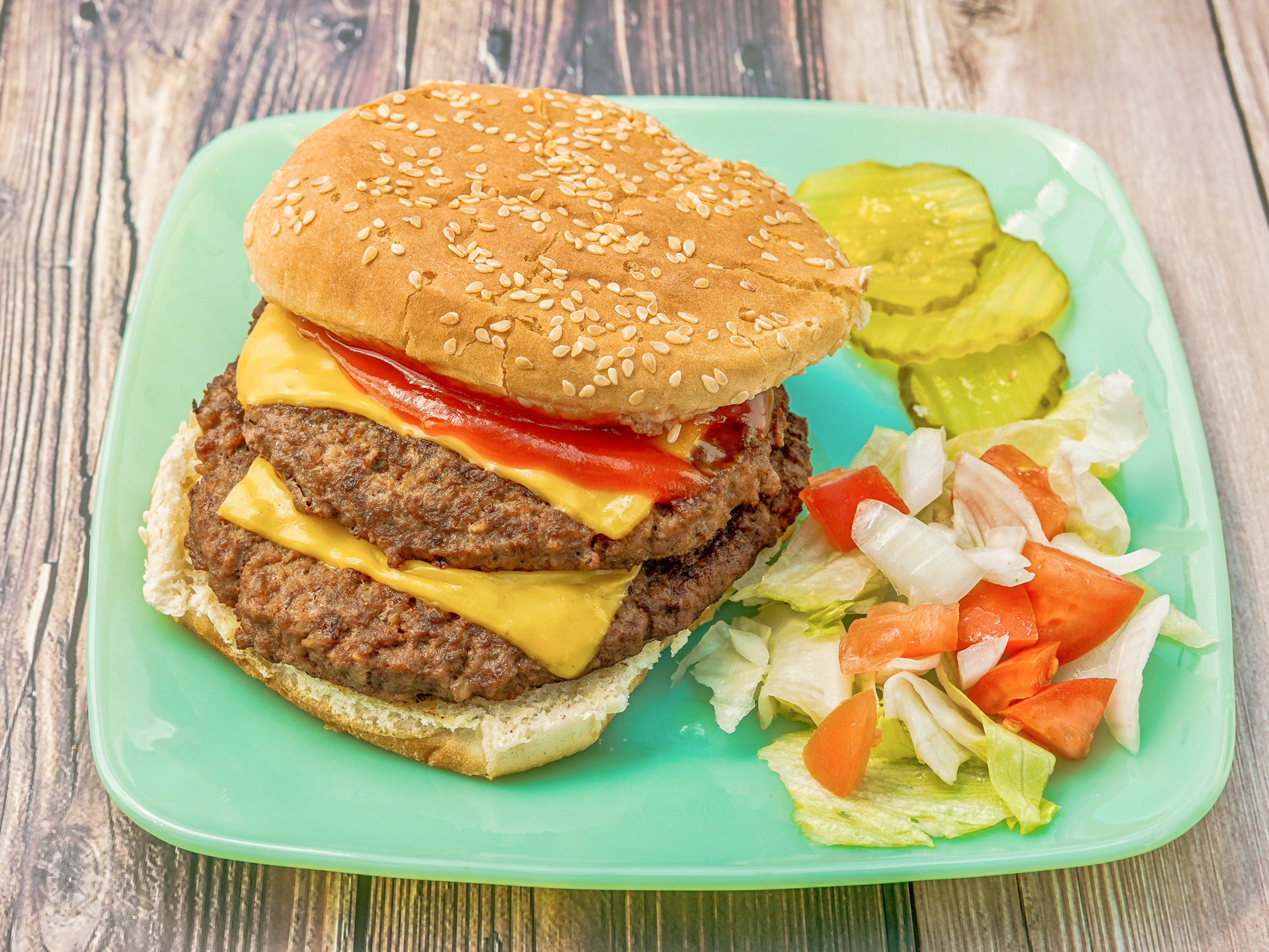 Order Double Cheeseburger food online from Mikey Kitchen store, Elmwood Place on bringmethat.com