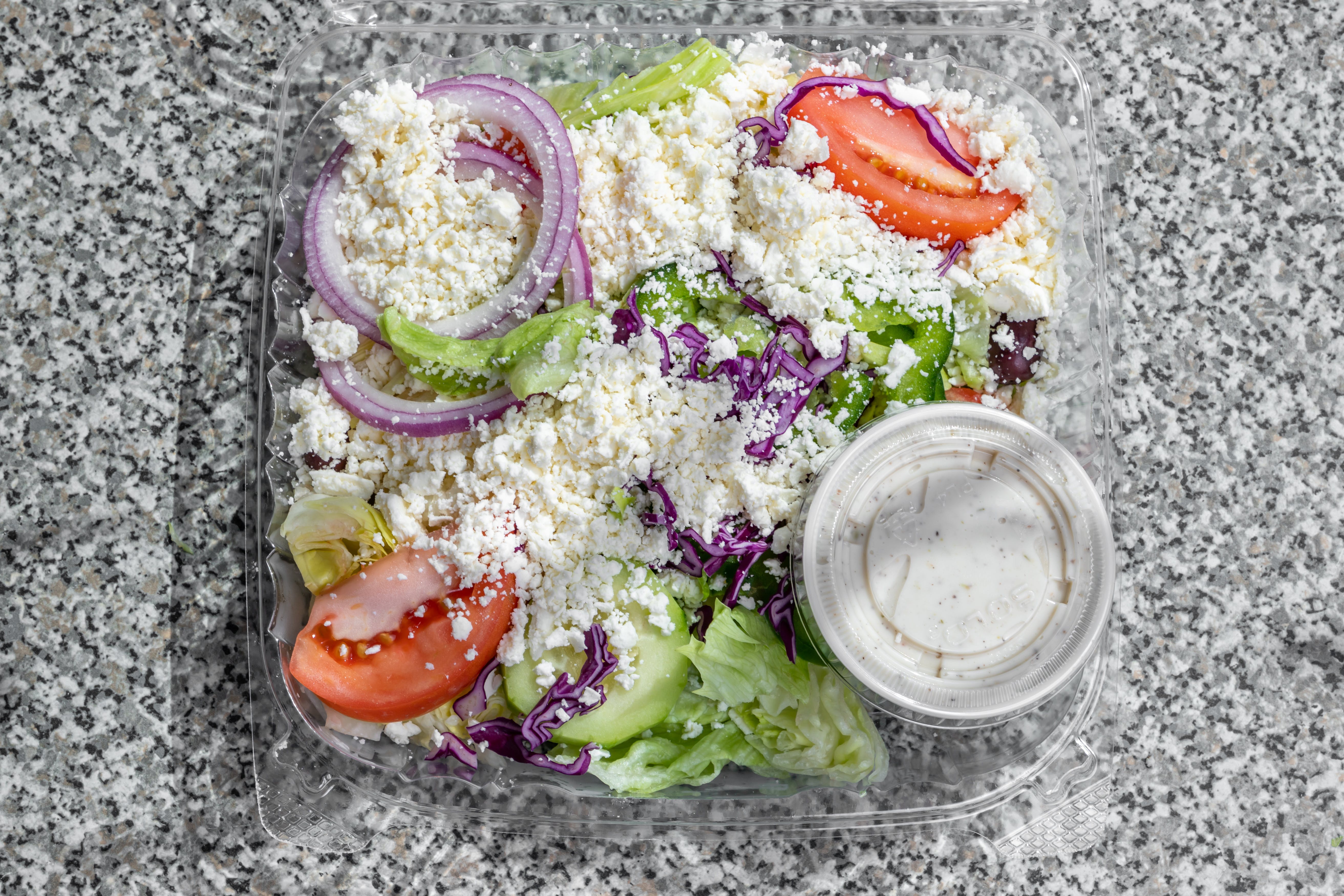 Order Greek Salad - Salad food online from Ellie's Pizza store, Beverly Farms on bringmethat.com