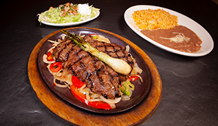 Order Carne Asada food online from La Parrilla Mexican Restaurant store, Acworth on bringmethat.com