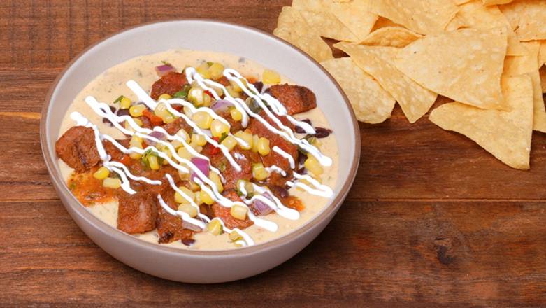 Order So Rich Loaded Queso food online from Pure Gold By Qdoba store, LONE TREE on bringmethat.com