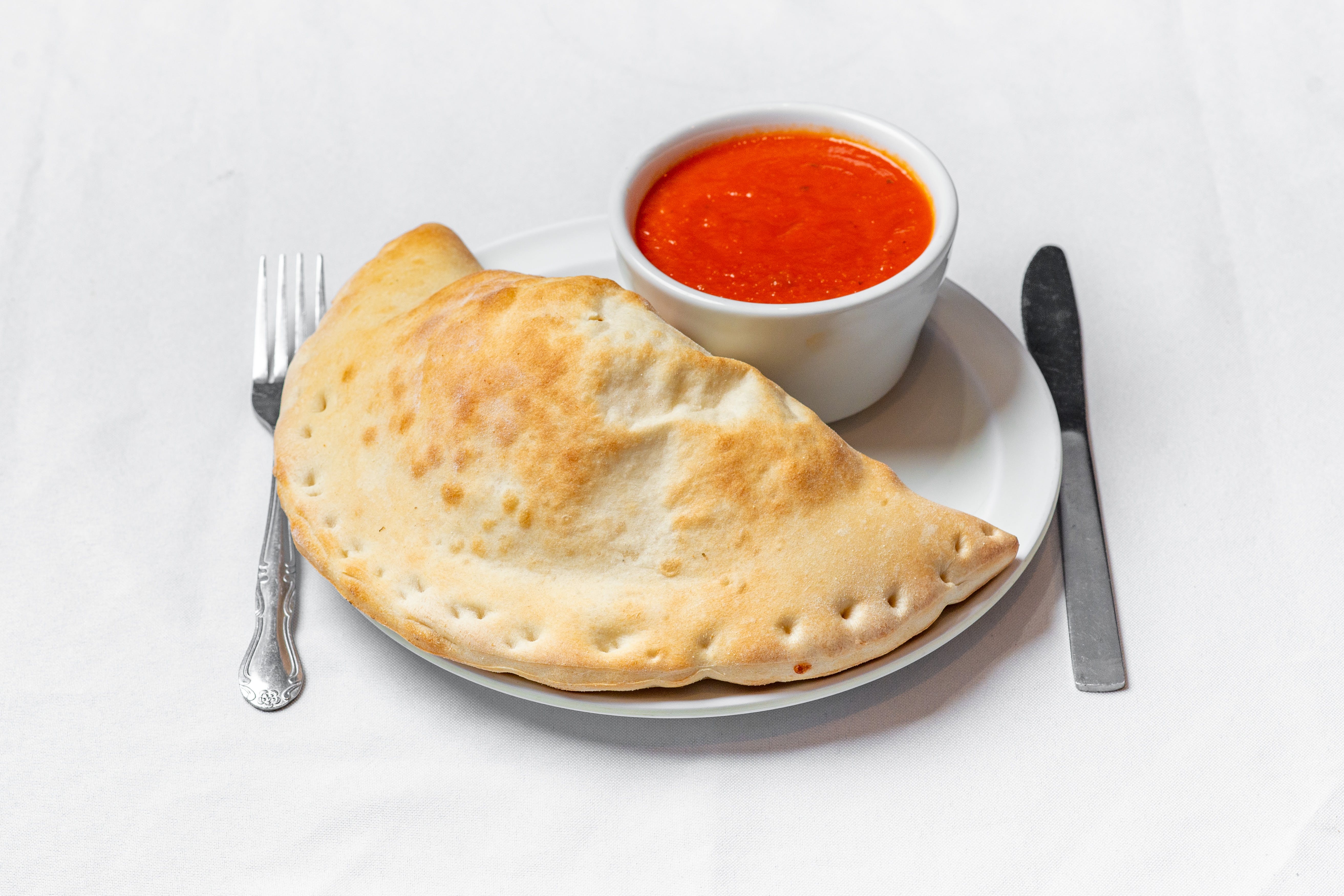 Order Cheese Calzone - Calzone food online from Annabella Italian Restaurant store, Whitehouse Station on bringmethat.com