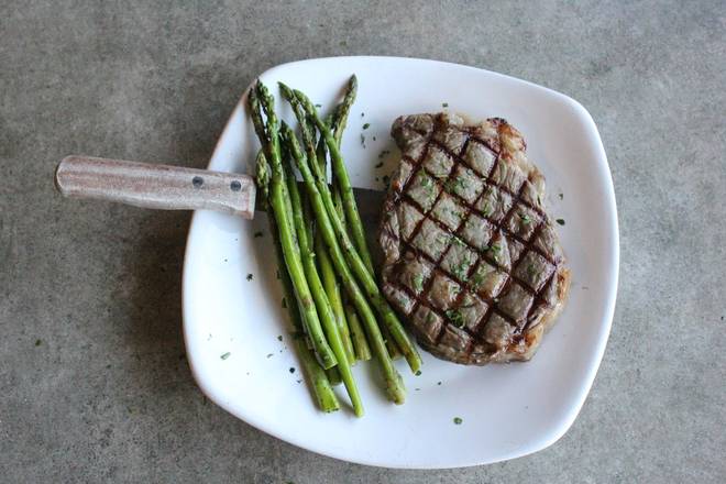 Order Ribeye* food online from Uccello Ristorante store, Grand Rapids on bringmethat.com