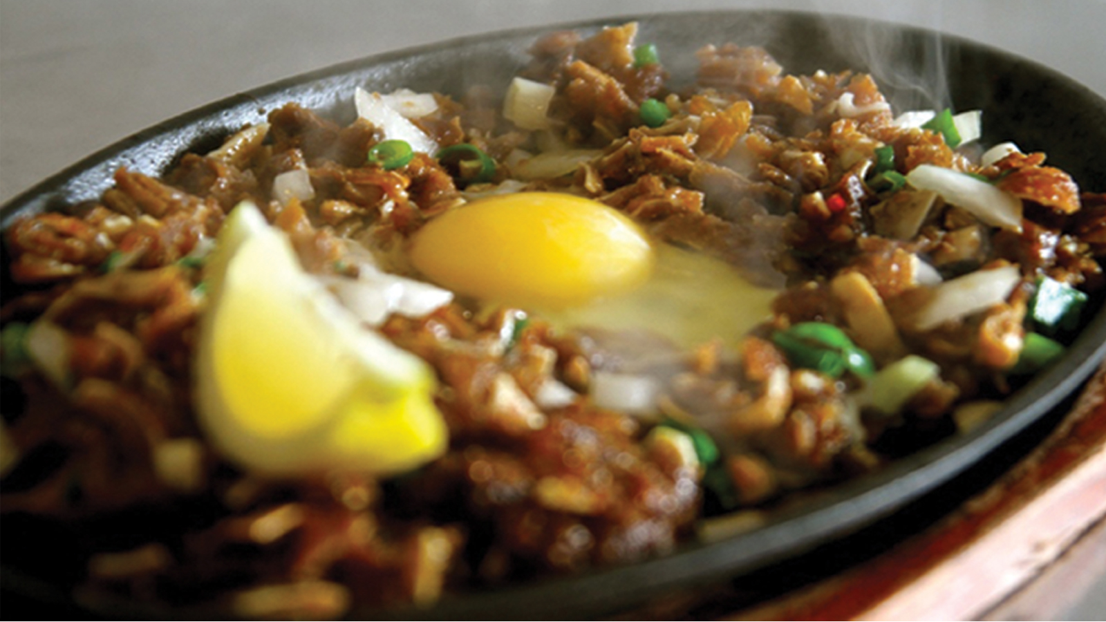 Order Sizzling Sisig food online from Bamboo Bistro store, Los Angeles on bringmethat.com