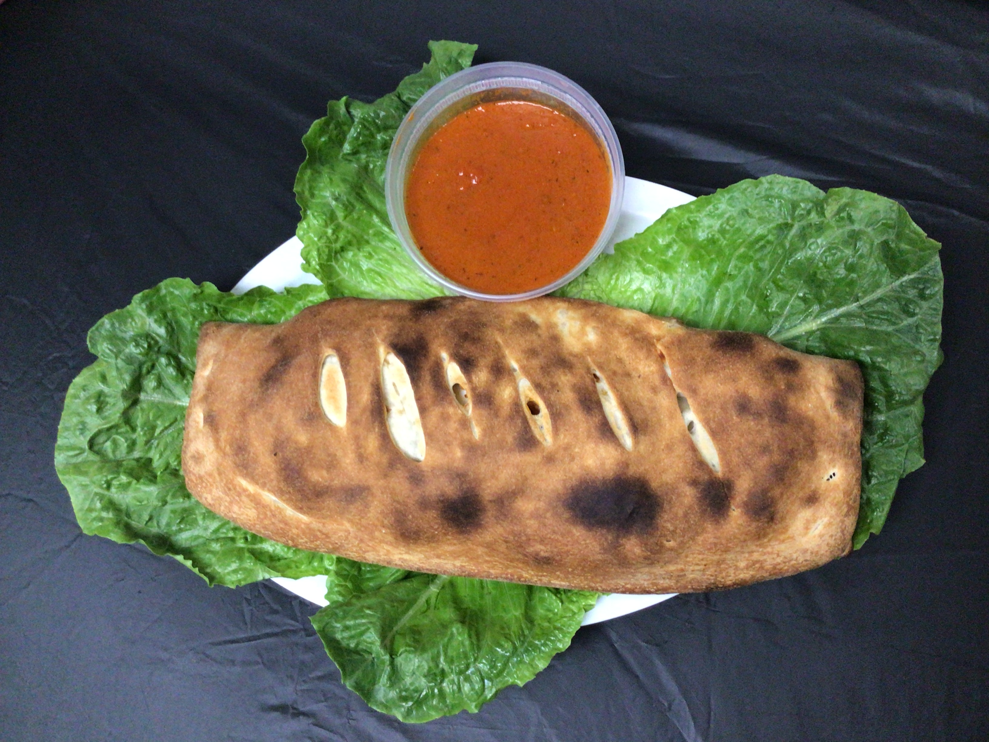 Order Mozzarella Cheese Stromboli food online from Panchos Pizza store, Milford on bringmethat.com