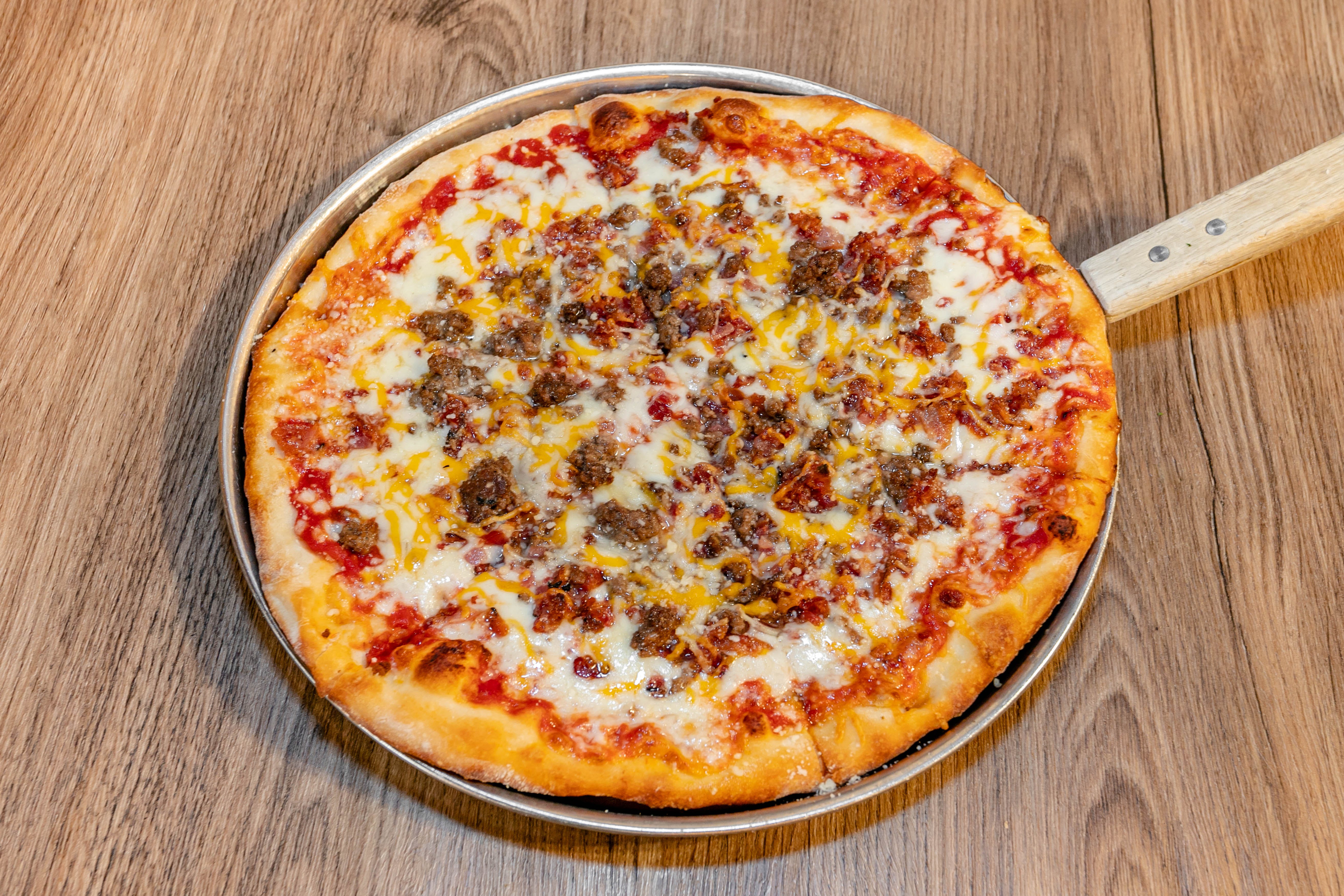 Order Bacon Cheeseburger Pizza - 10'' food online from Sopranos Grill store, Braselton on bringmethat.com
