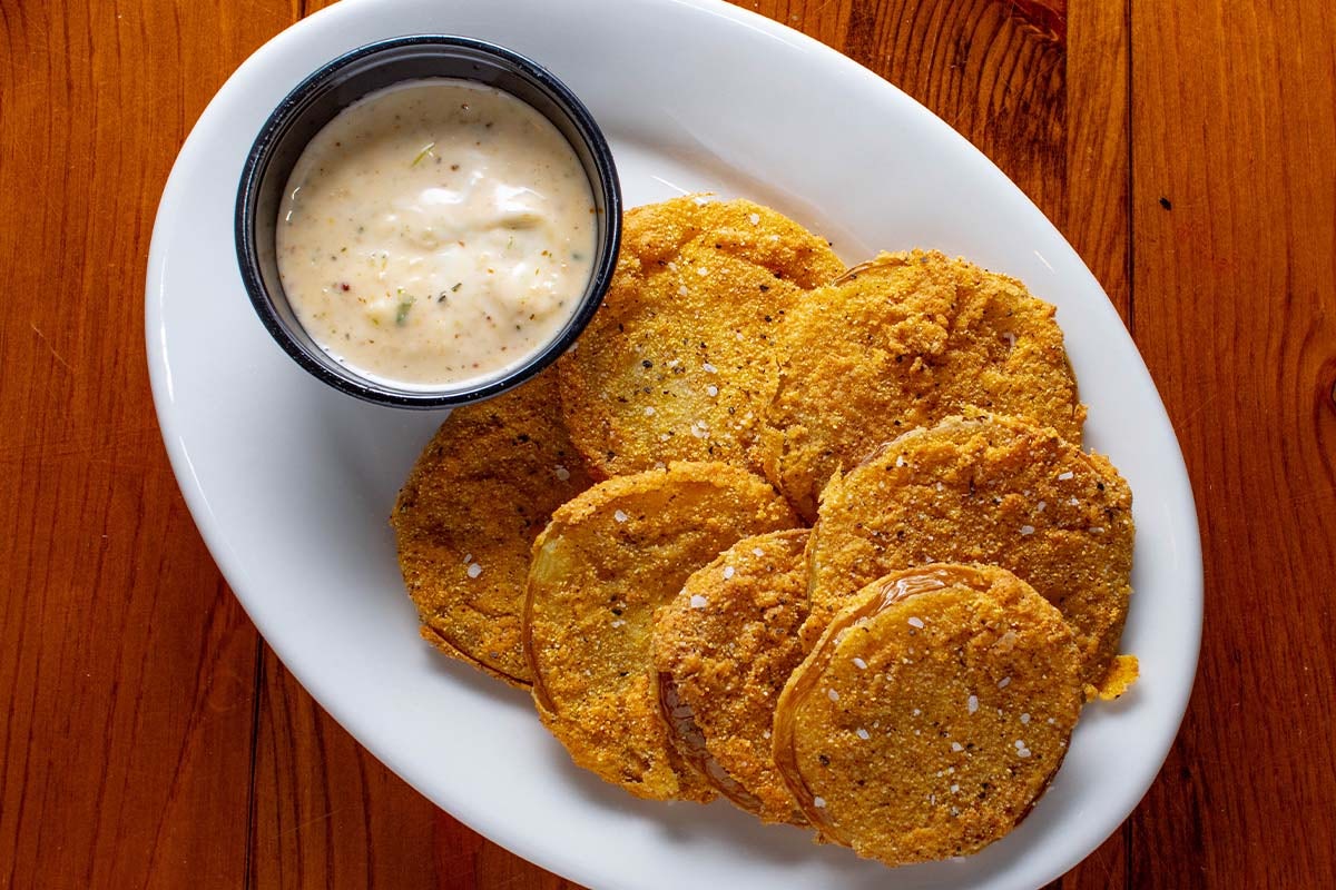 Order Fried Green Tomatatoes food online from Boudreaux's Cajun Kitchen store, Houston on bringmethat.com