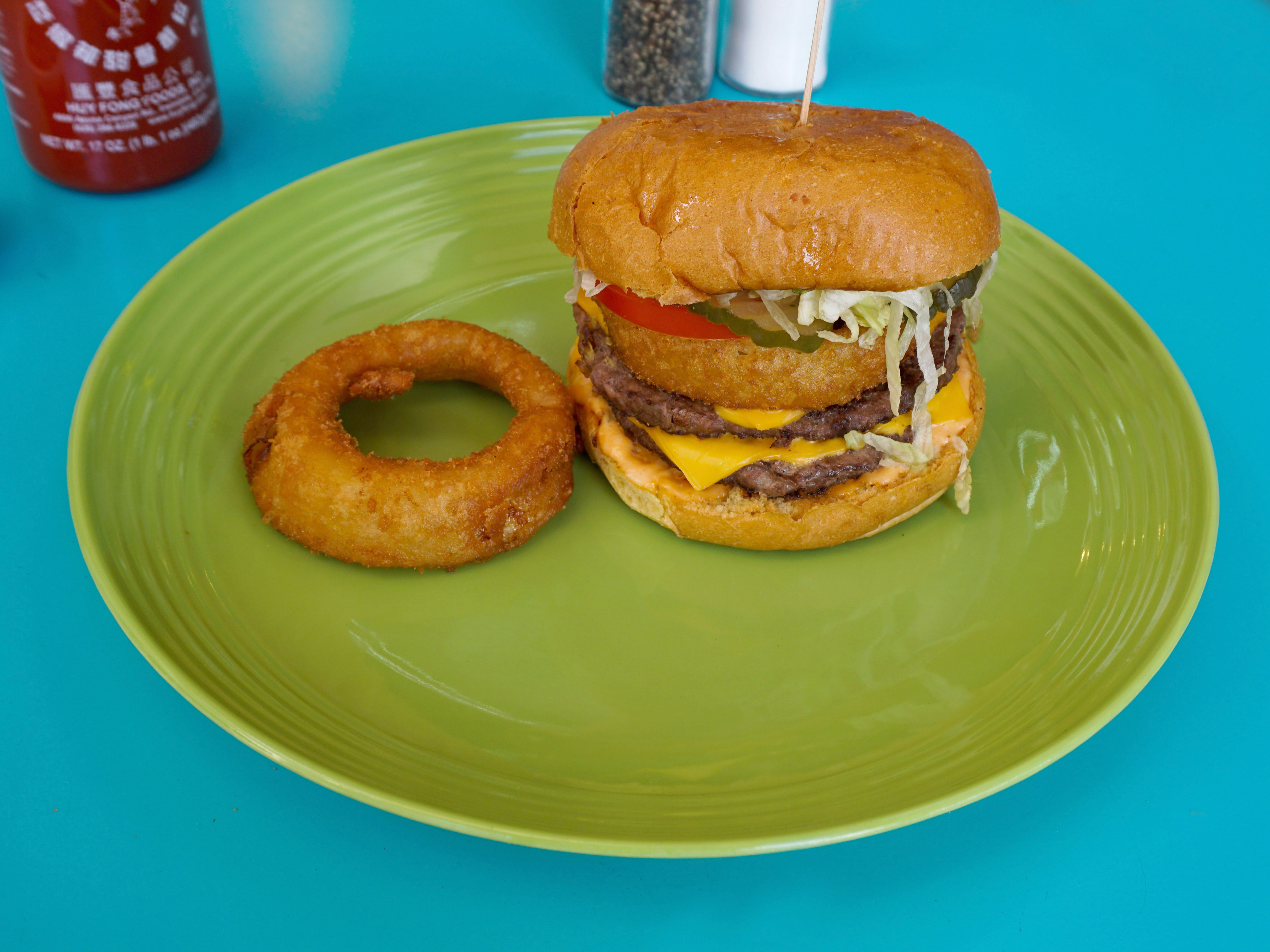 Order 1/2 lb. Tony Gwynn Burger food online from The Deli Stop Sports Pub store, San Diego on bringmethat.com