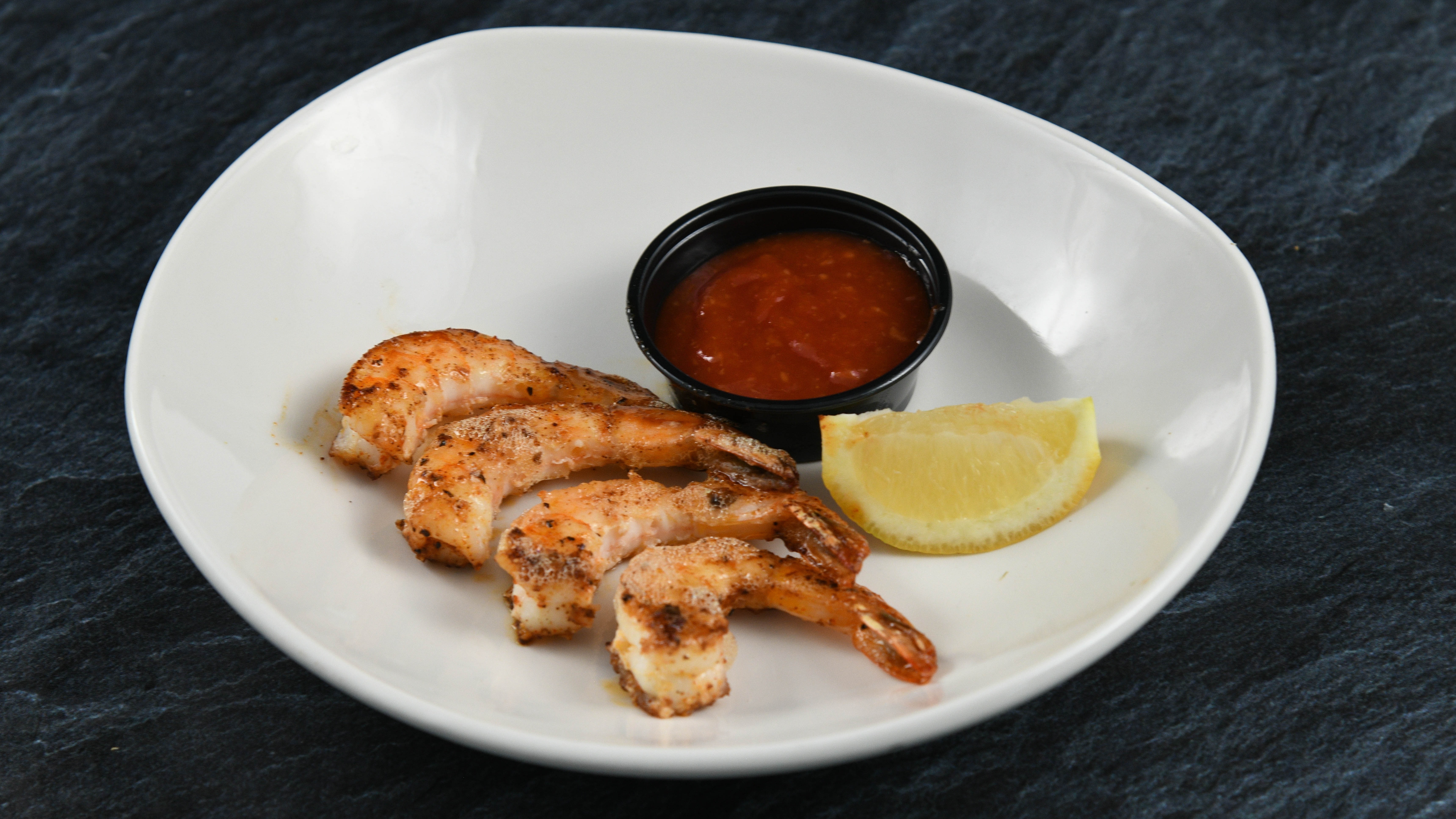 Order Add Grilled Shrimp food online from Rainforest Cafe store, Atlantic City on bringmethat.com