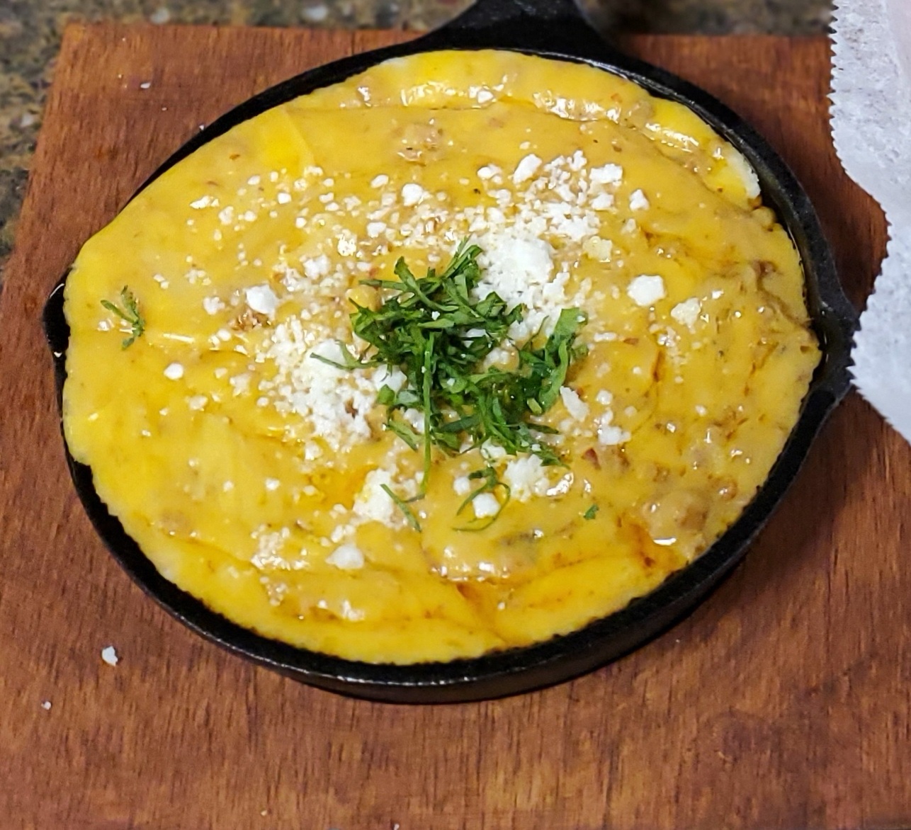 Order Queso Fundido with Chorizo food online from The Avocado Mexican Grill store, Runnemede on bringmethat.com
