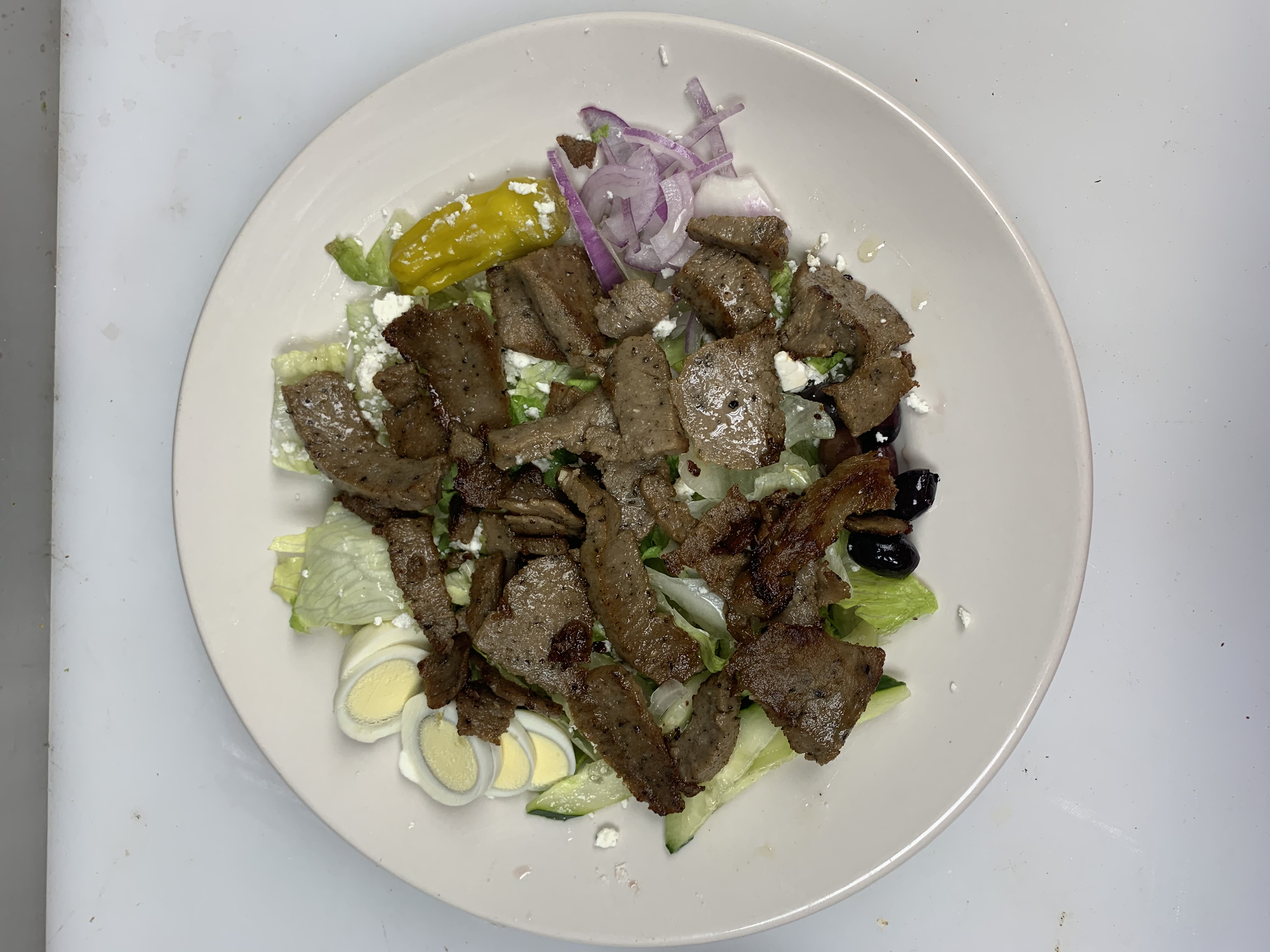 Order Gyro Salad food online from Texas Flaming Grill store, Abilene on bringmethat.com