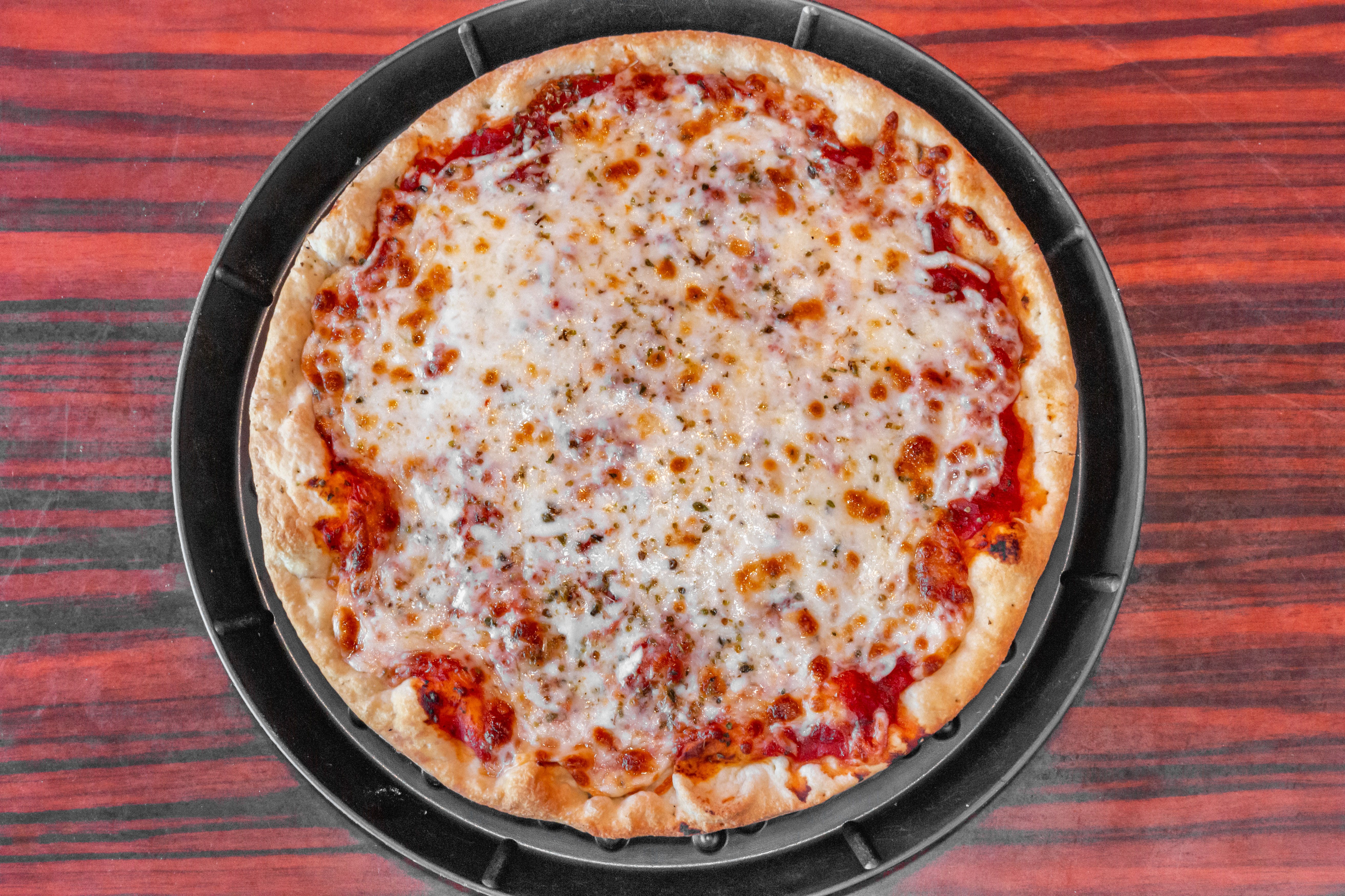 Order Thin Crust Cheese Pizza - Small 12" food online from Pietanza's store, Bartlett on bringmethat.com