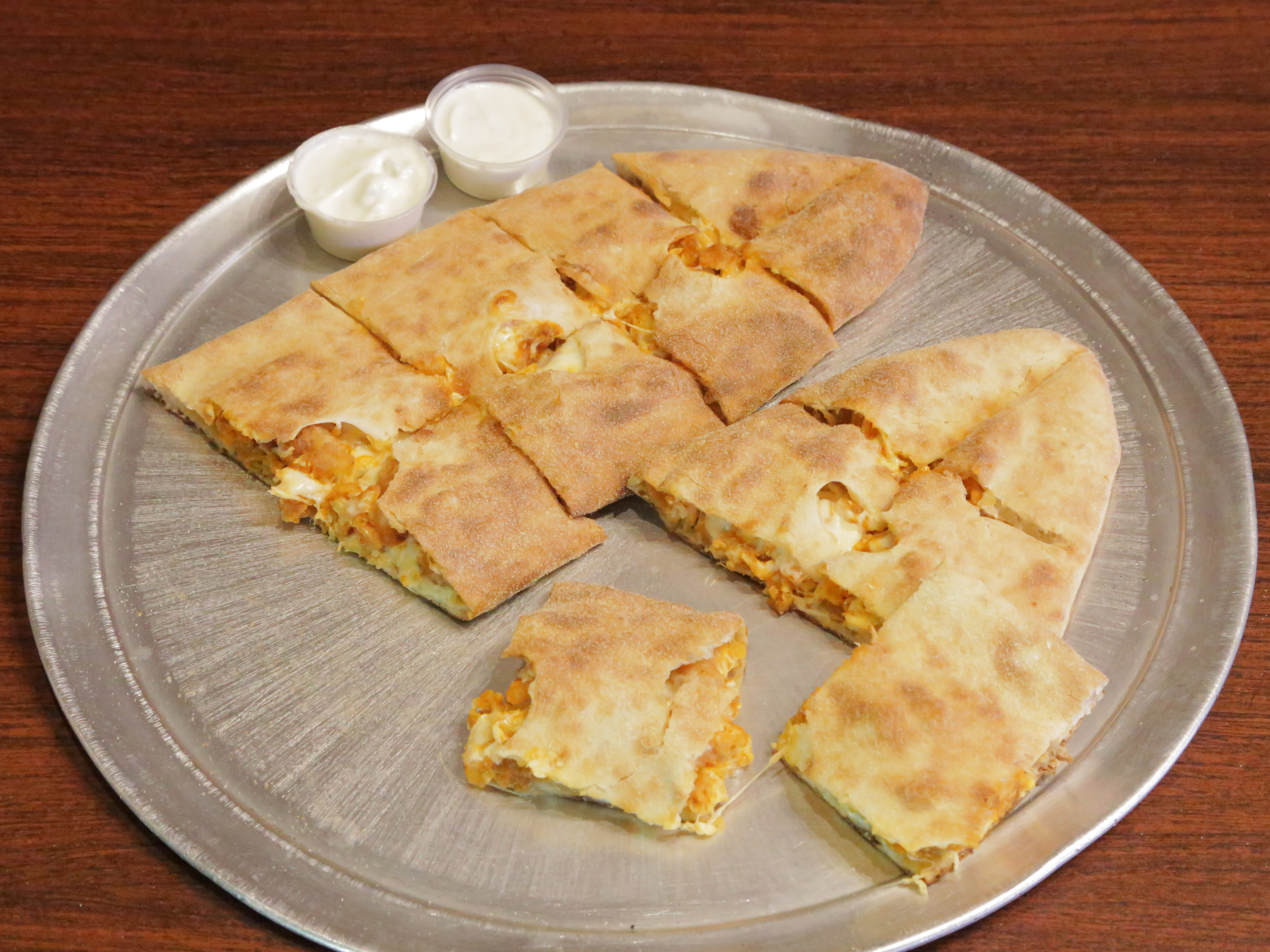 Order Buffalo Chicken Calzone food online from Schoolhouse Pizza store, Quincy on bringmethat.com