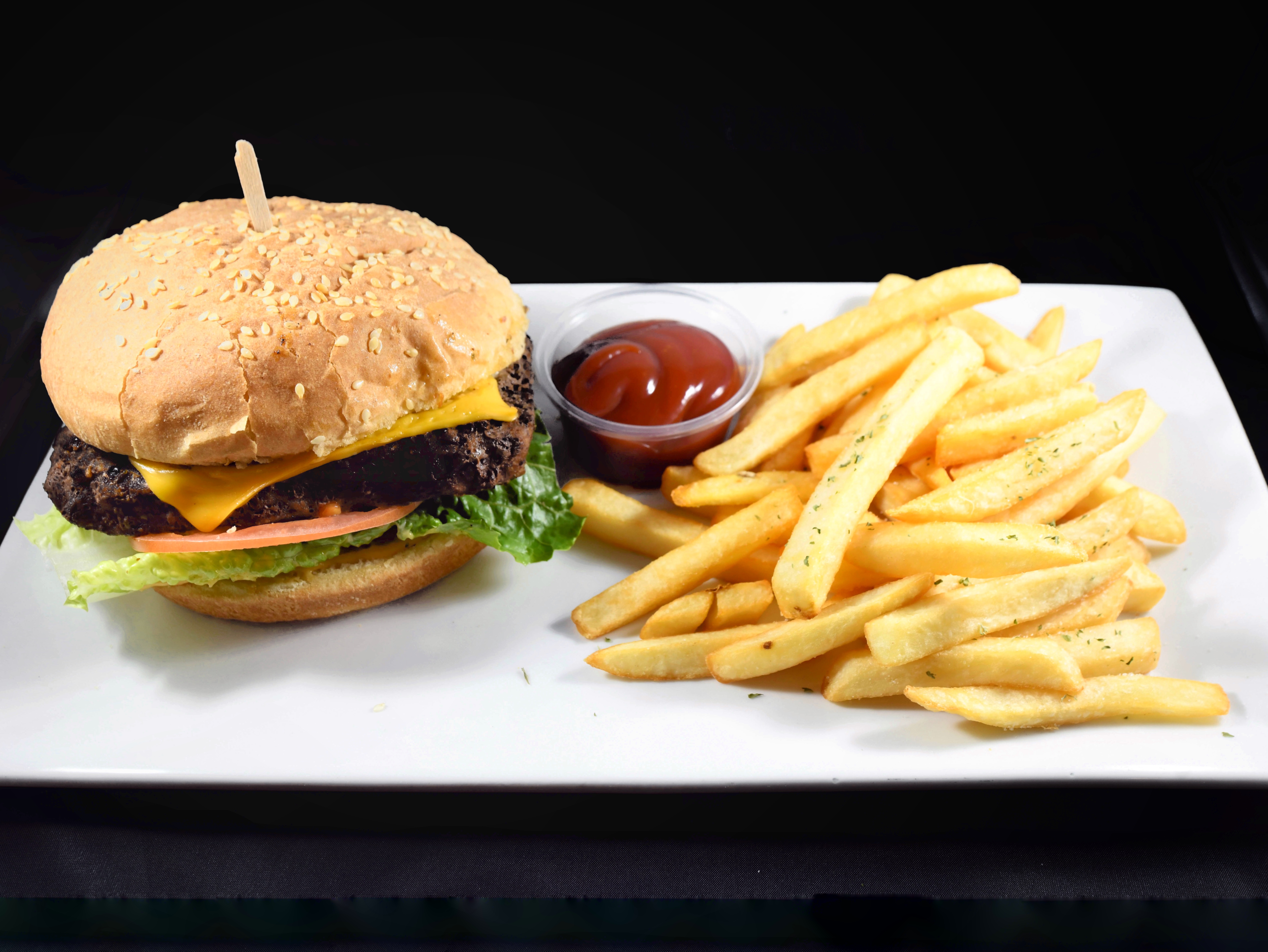 Order 8 oz. Angus Beef Cheeseburger with Fries food online from Twist Restaurant store, Brooklyn on bringmethat.com