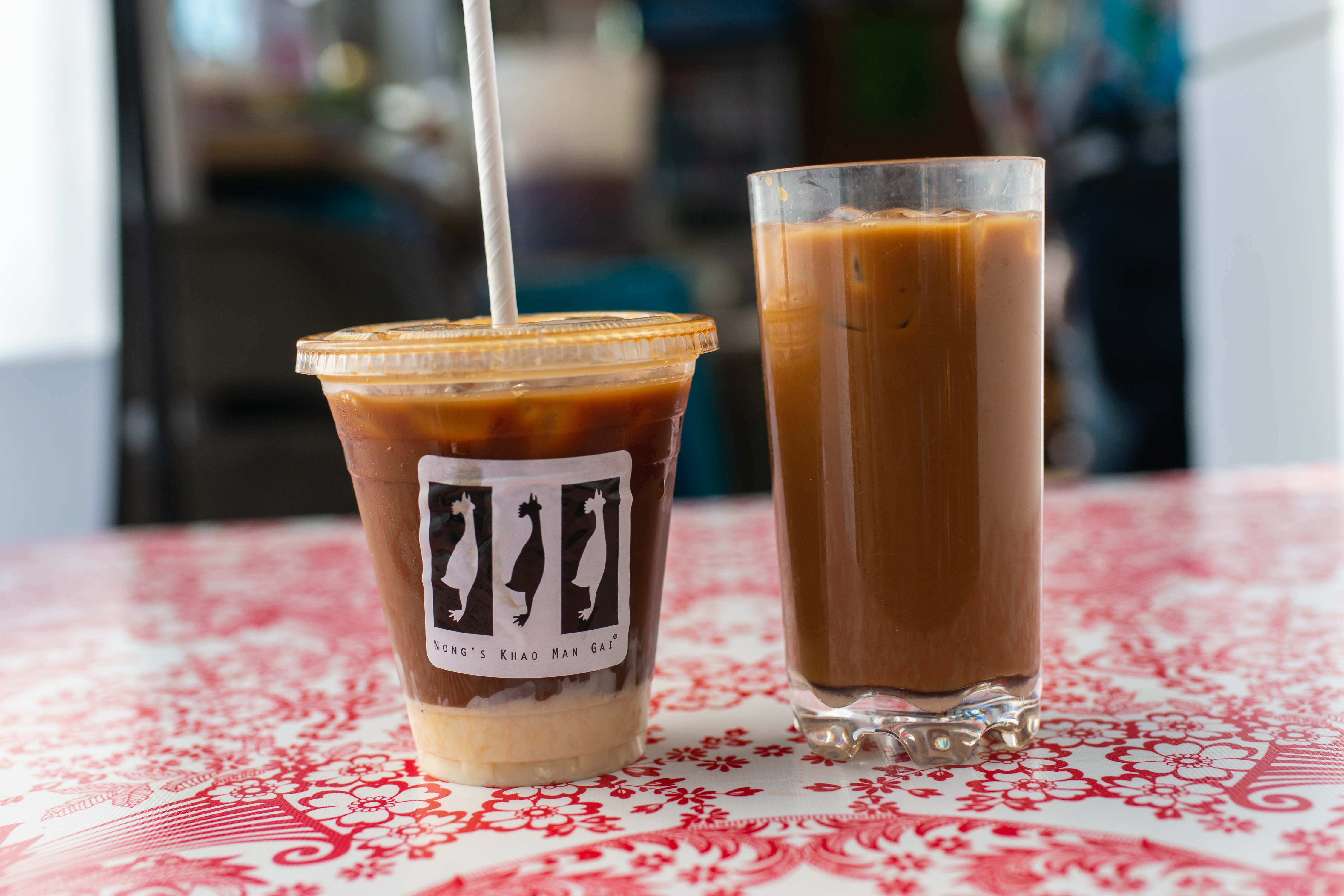 Order Iced Coffee food online from Nong Khao Man Gai store, Portland on bringmethat.com