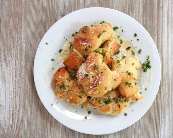 Order Garlic Knots food online from Reginelli's Pizzeria store, New Orleans on bringmethat.com