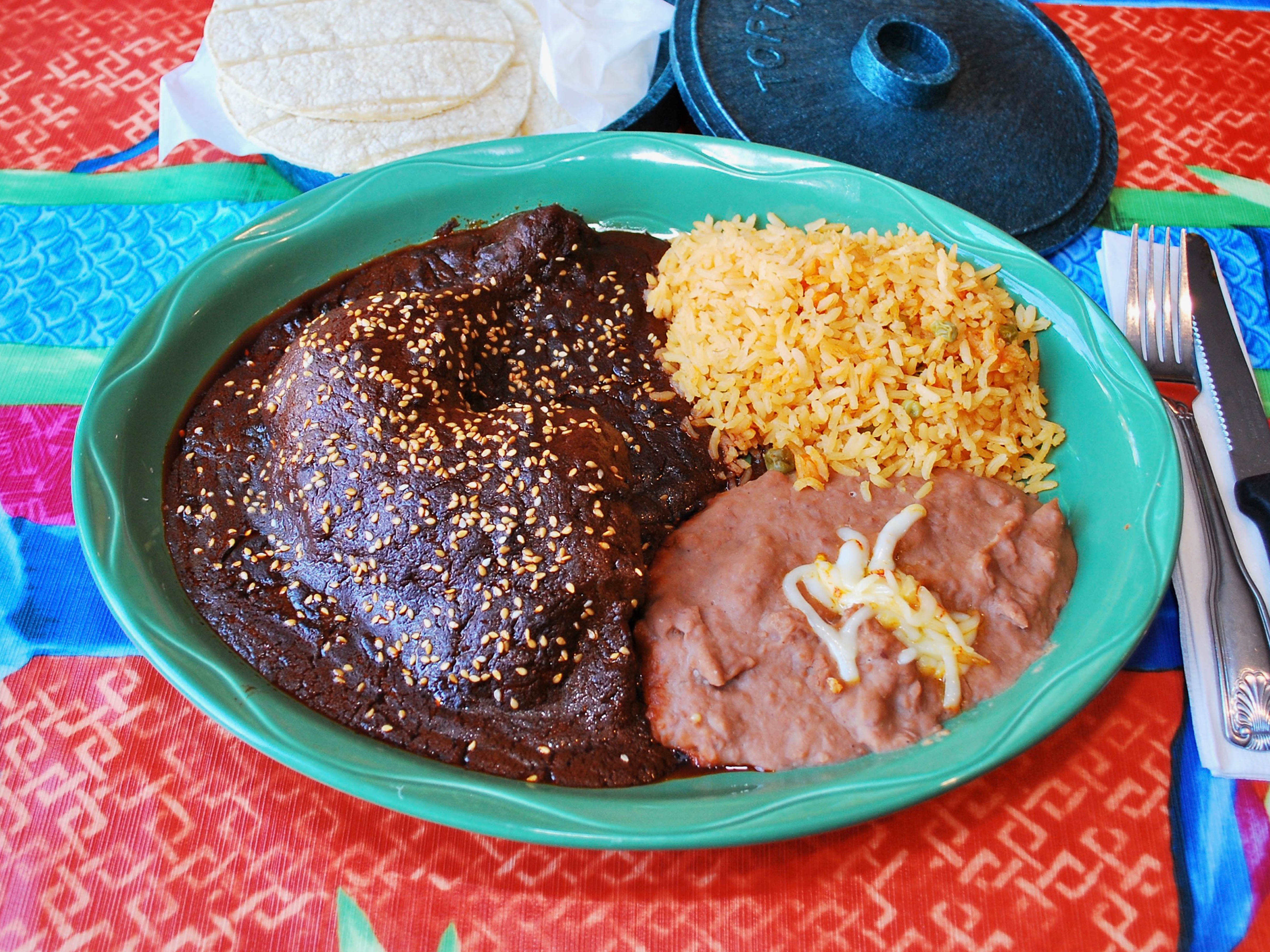 Order Mole Poblano con Pollo food online from Puebla Restaurant store, Chicago on bringmethat.com
