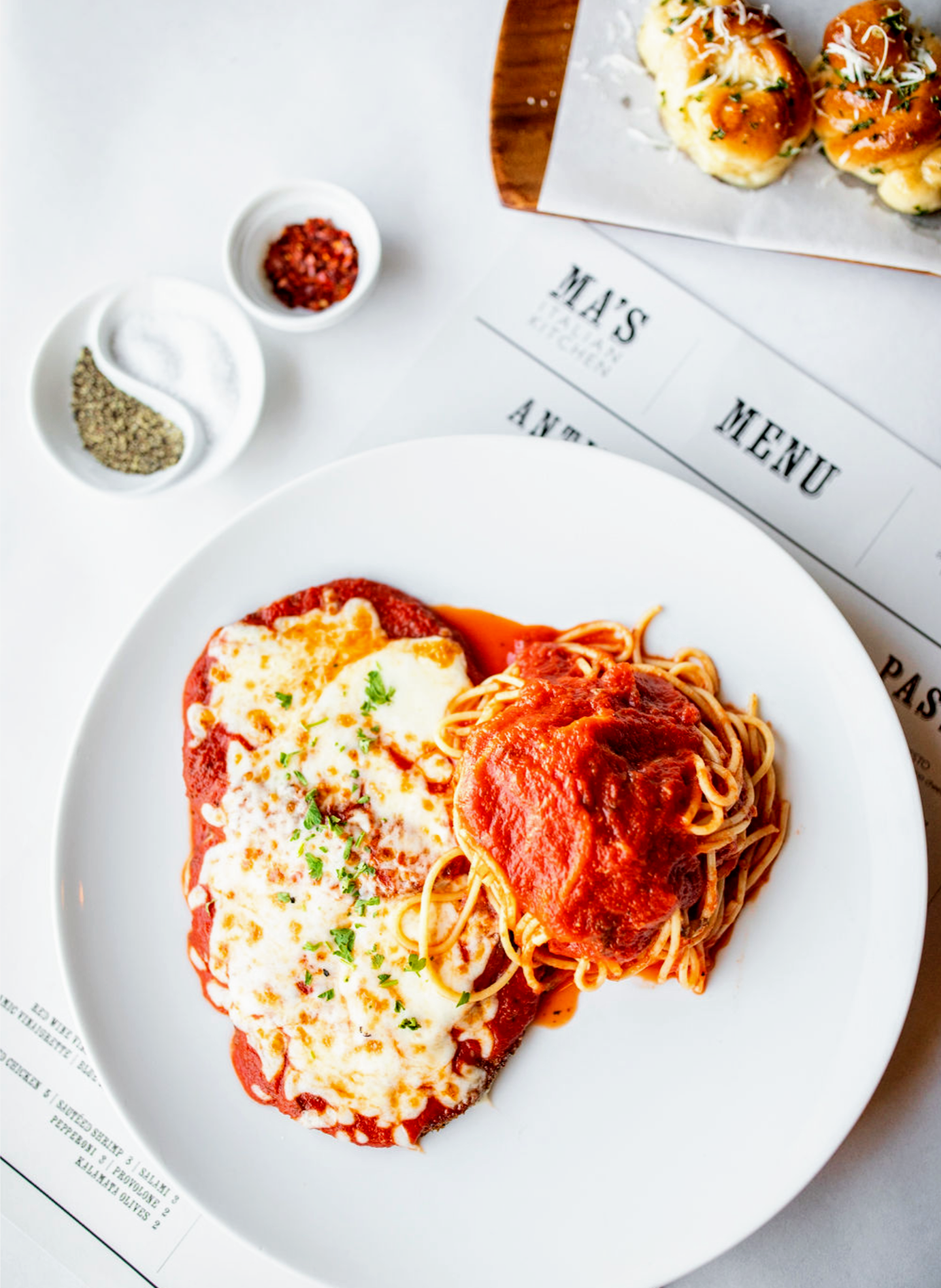 Order BAKED CHICKEN PARMIGIANA food online from Ma Italian Kitchen store, Burbank on bringmethat.com