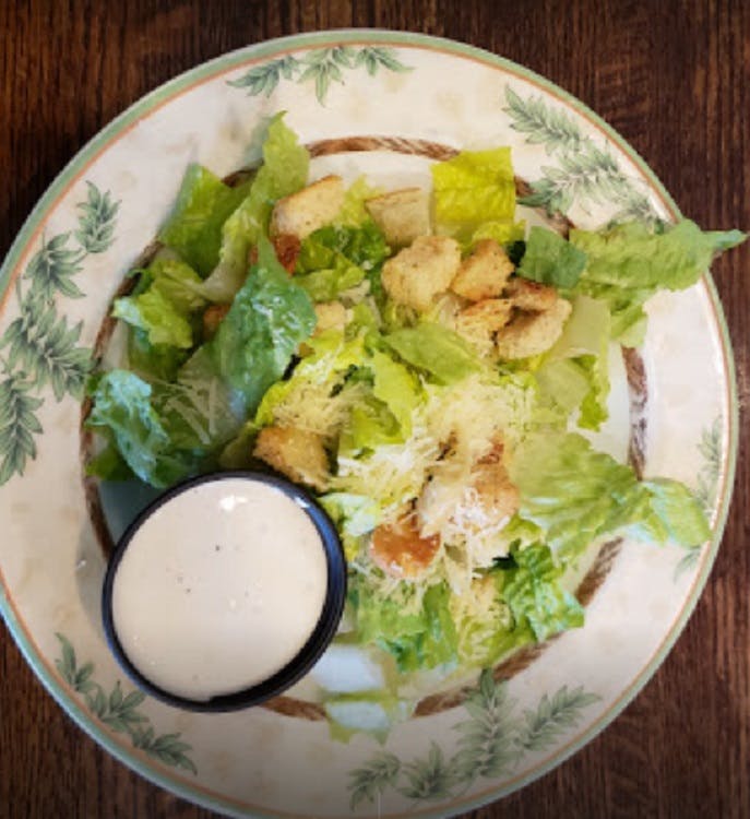 Order Caesar Salad Lunch - Salad food online from Delia's Pizzeria & Grill store, Springfield on bringmethat.com