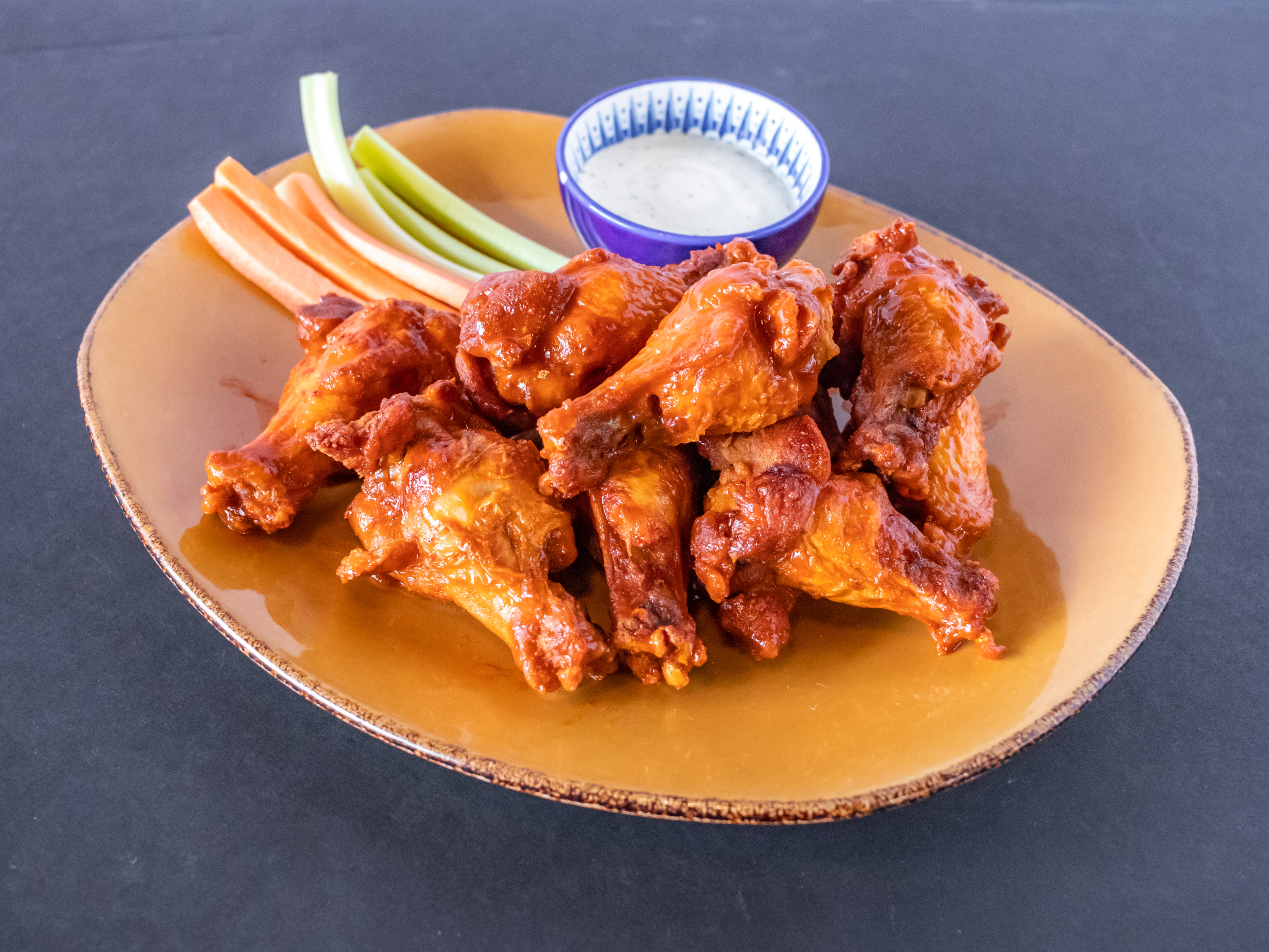 Order Wings food online from STEEL HOUSE BAR & GRILL store, Houston on bringmethat.com