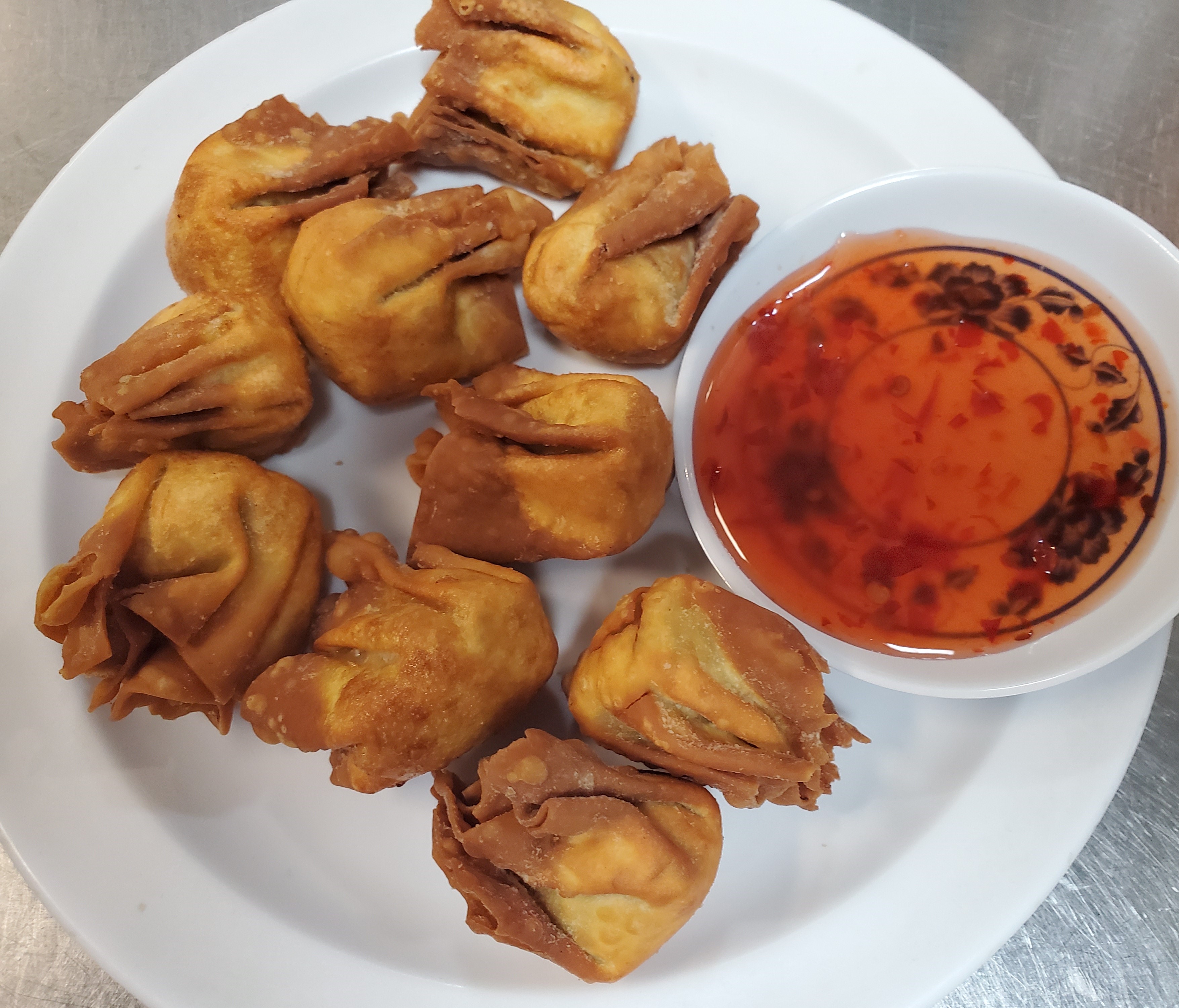 Order Fried Wonton food online from Singapore Cafe store, Sugar Land on bringmethat.com