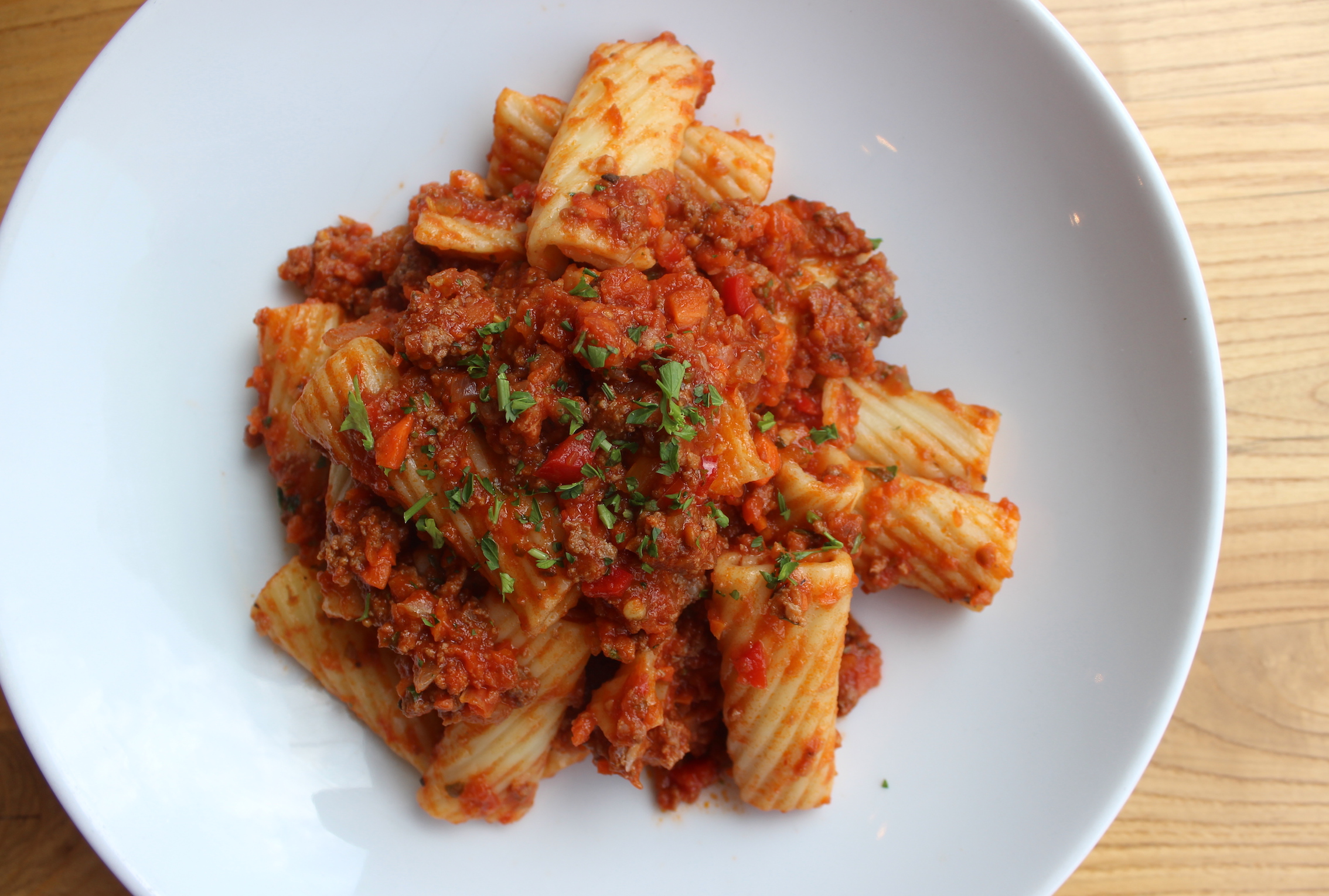 Order Rigatoni Bolognese food online from Zig Zag Kitchen store, Chicago on bringmethat.com