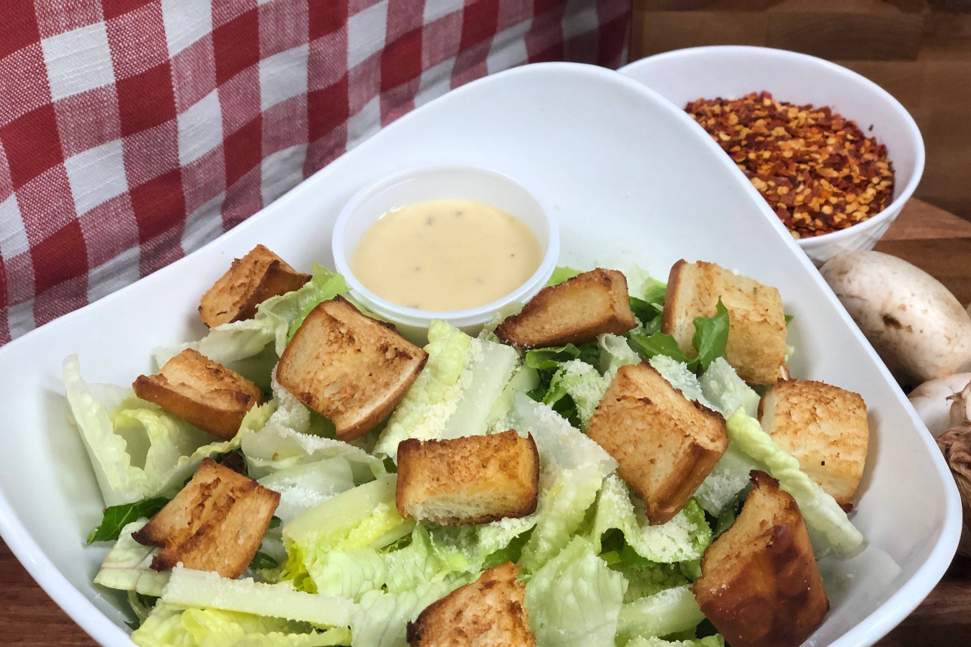 Order Caesar Salad food online from The Chicken Chicken Place store, Bethesda on bringmethat.com