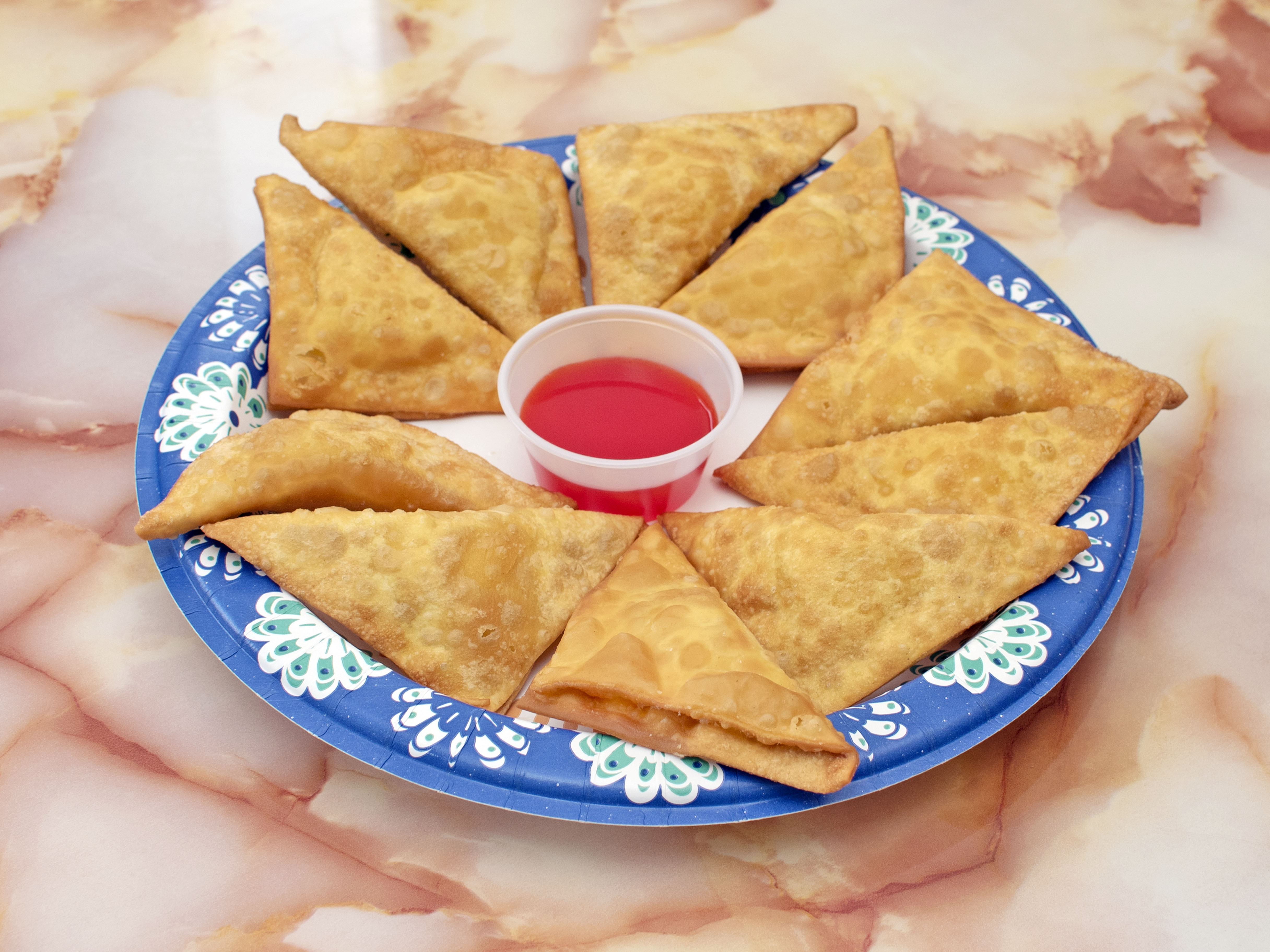 Order 11. Crab Meat Rangoon food online from China Wok store, Winchester on bringmethat.com
