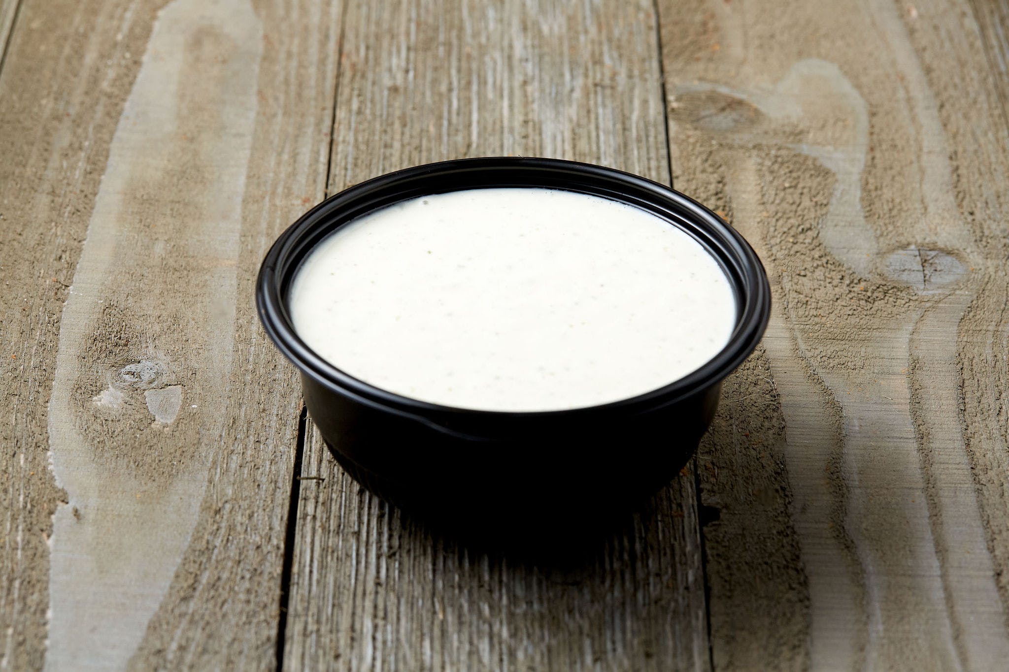 Order Ranch Dressing - Cup food online from Simple Simon Pizza store, Paola on bringmethat.com
