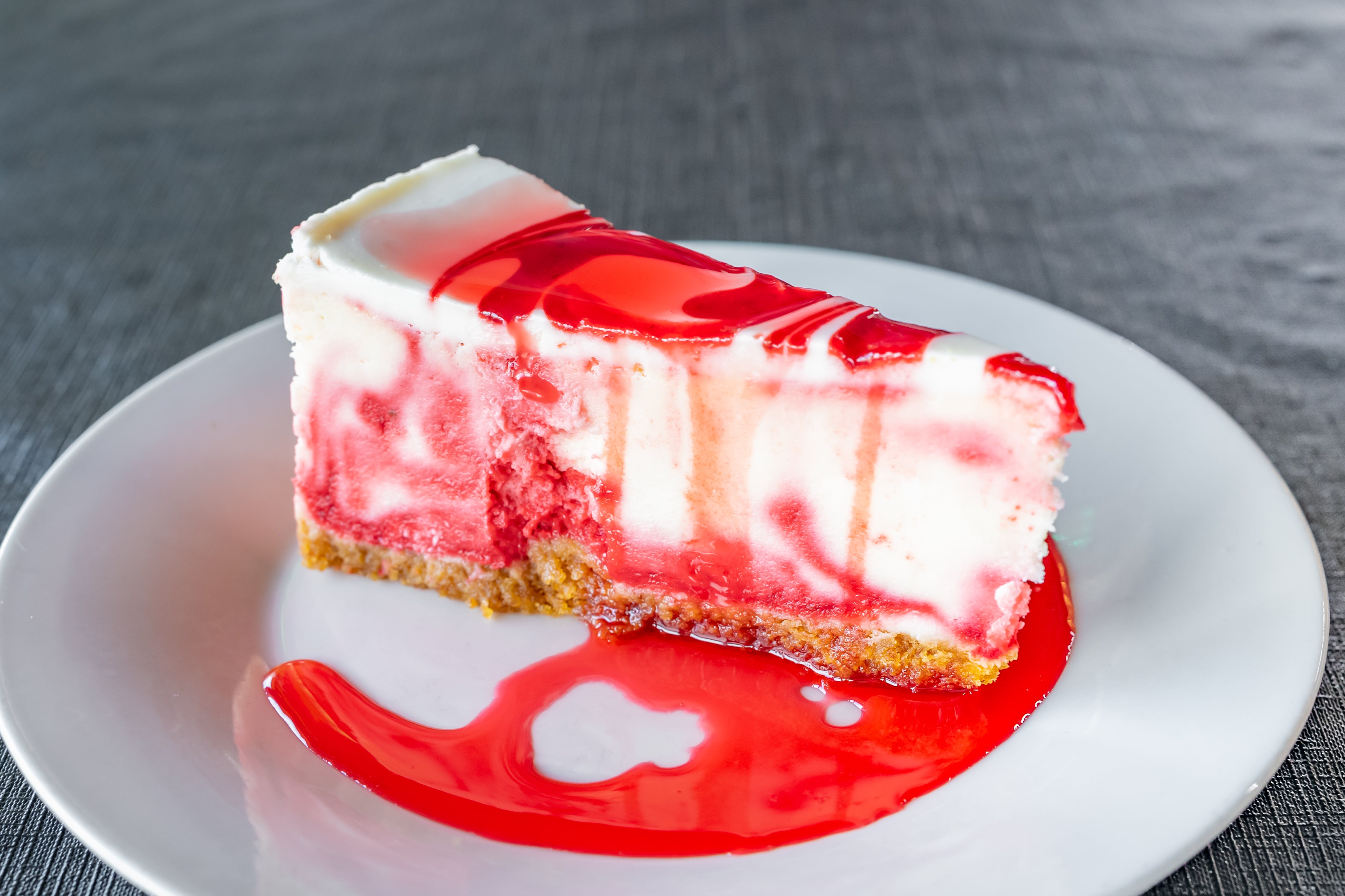 Order Strawberry Cheesecake - Dessert food online from Luigi's Italian Restaurant  store, Fort Worth on bringmethat.com