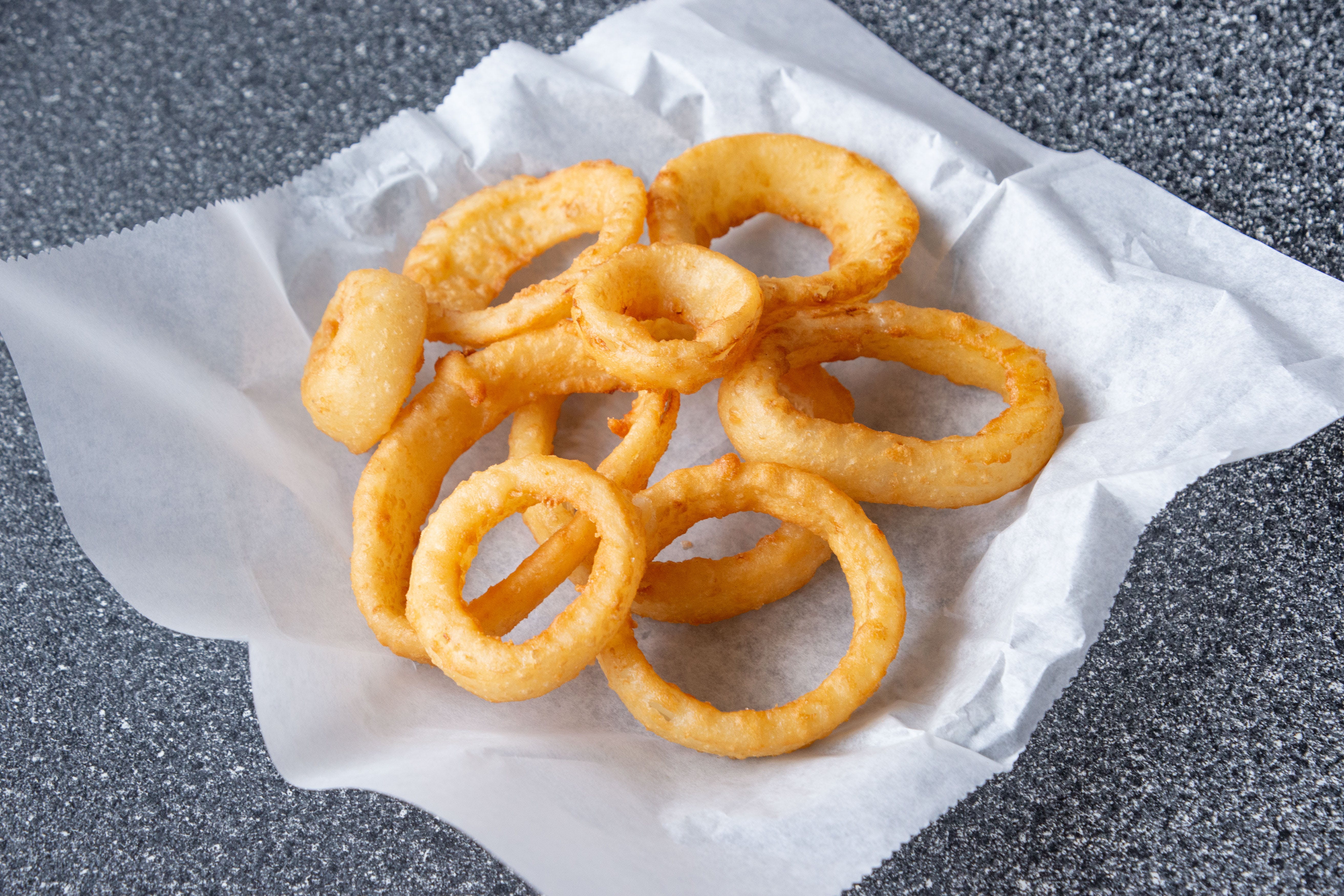 Order Onion Rings - Appetizer food online from Pizza City store, Woodbury Heights on bringmethat.com