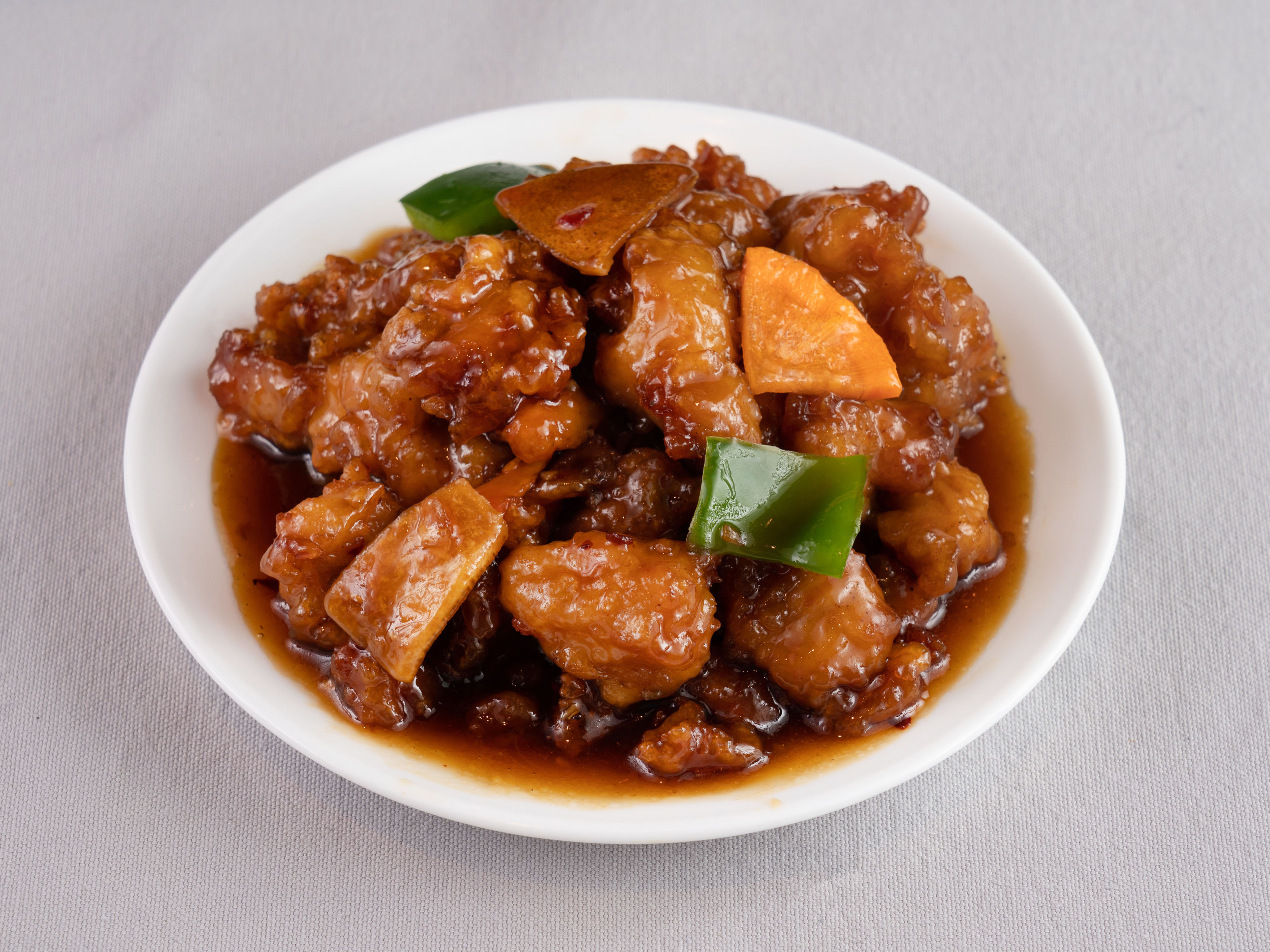 Order Orange Chicken food online from Manchu Wok store, College Station on bringmethat.com