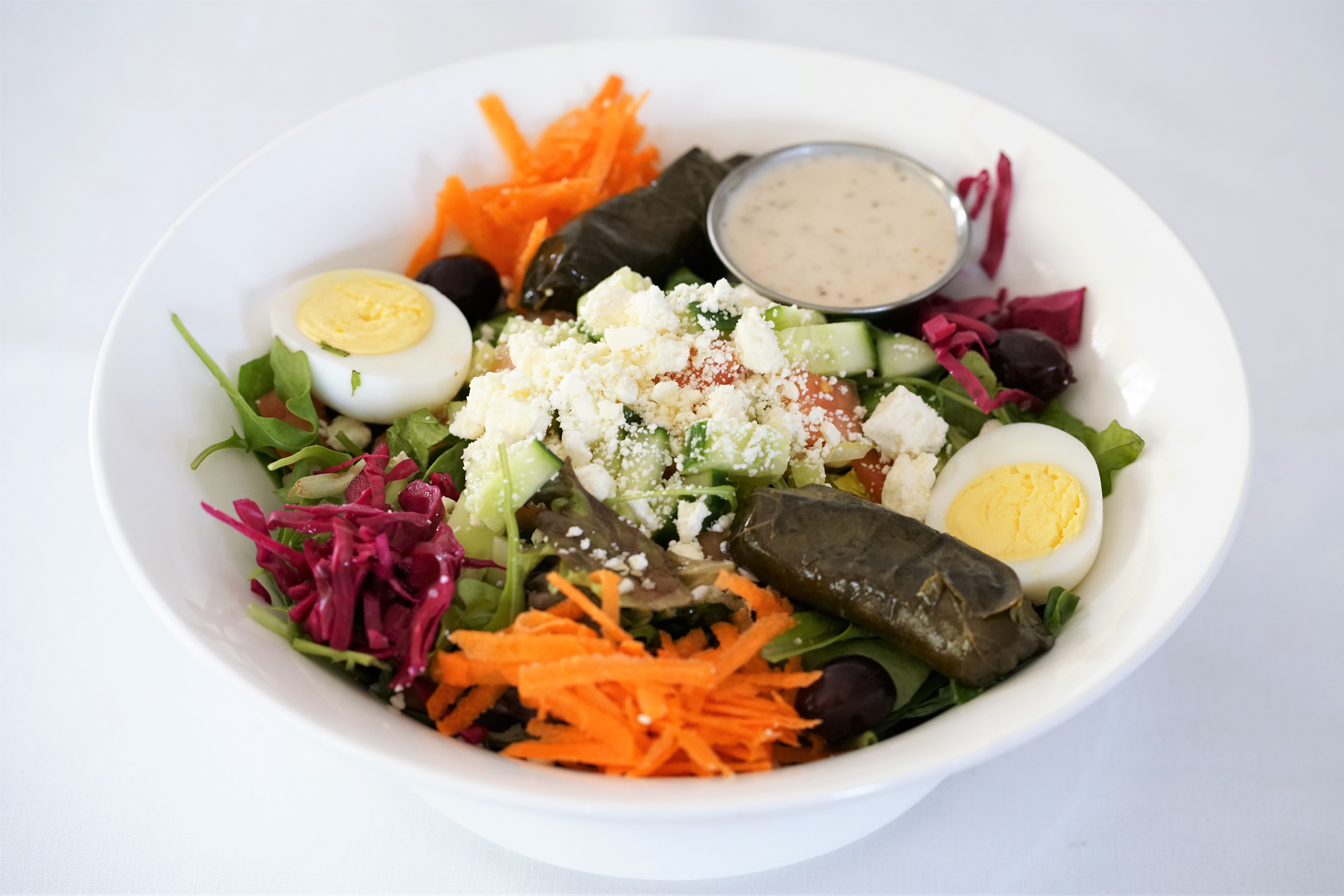 Order Arugula Salad food online from Lezzet Restaurant store, Centreville on bringmethat.com