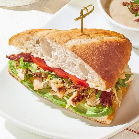 Order CHICKEN CALIFORNIA CLUB SANDWICH food online from California Pizza Kitchen store, Troy on bringmethat.com