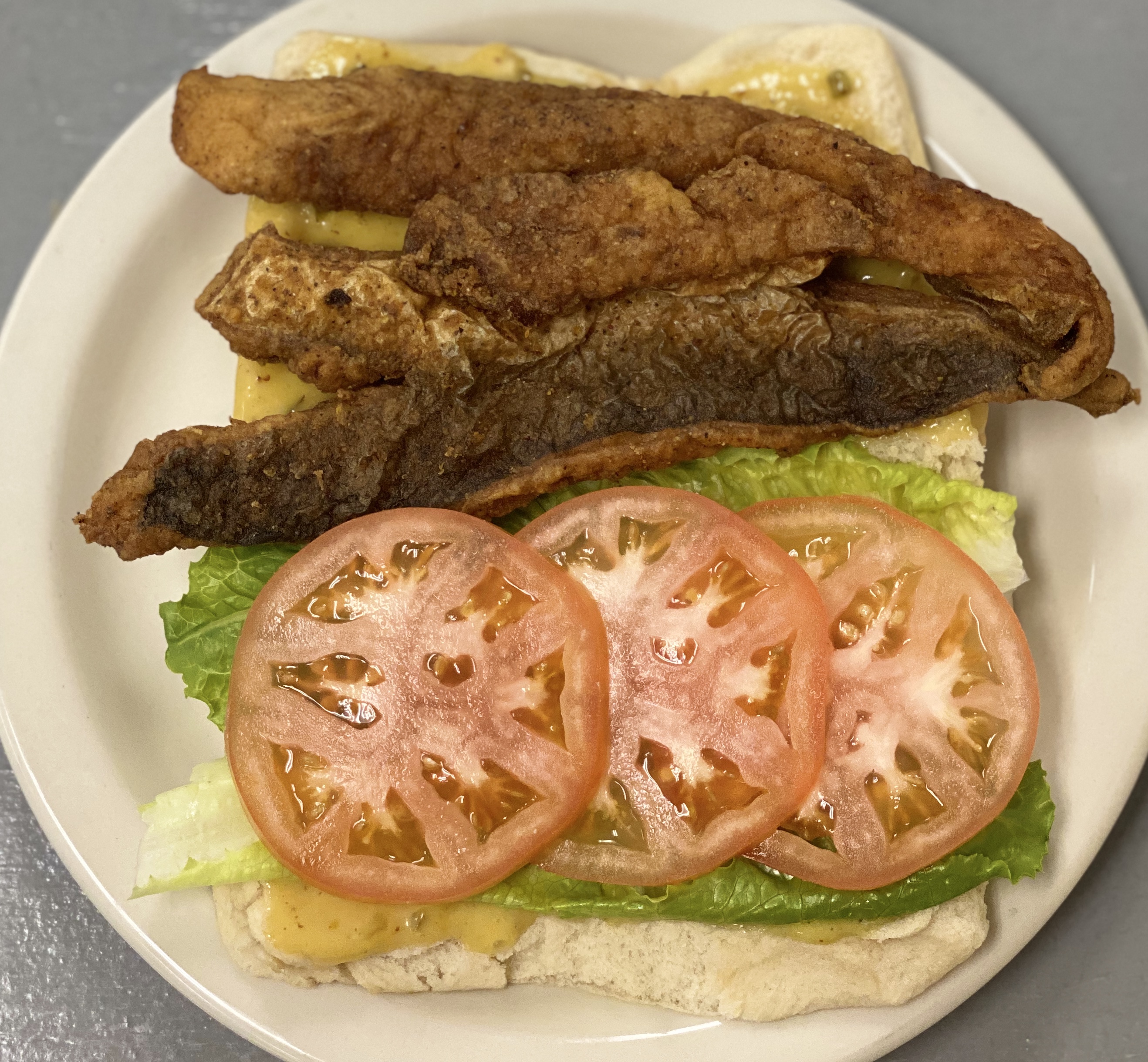 Order Fish Sandwich food online from Getti Island Spyce store, Bowie on bringmethat.com
