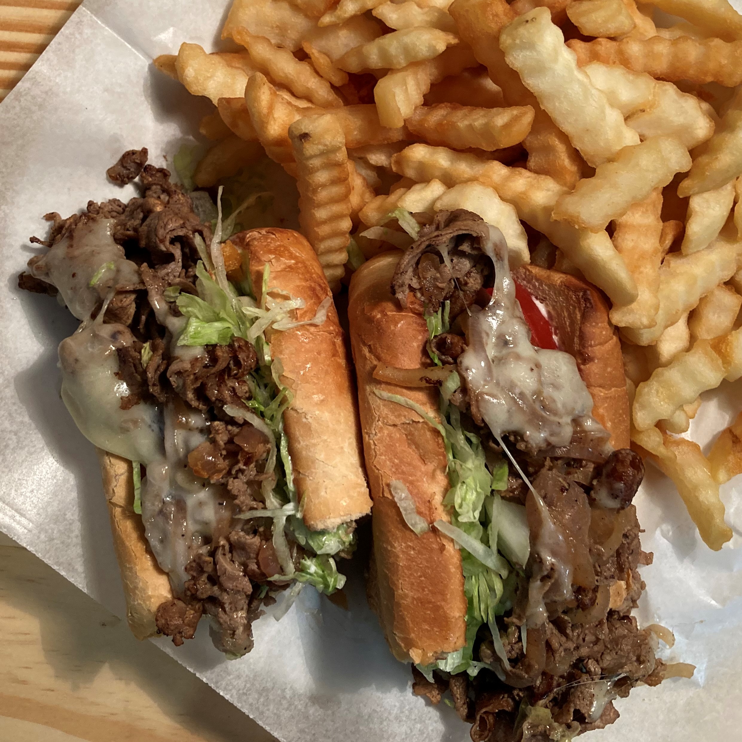 Order Famous Steak and Cheese Sub food online from Pizza Stop store, Silver Spring on bringmethat.com