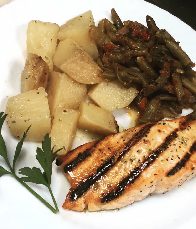 Order GRILLED SALMON w/2 sides food online from Trapezaria Kuzina store, Rockville on bringmethat.com